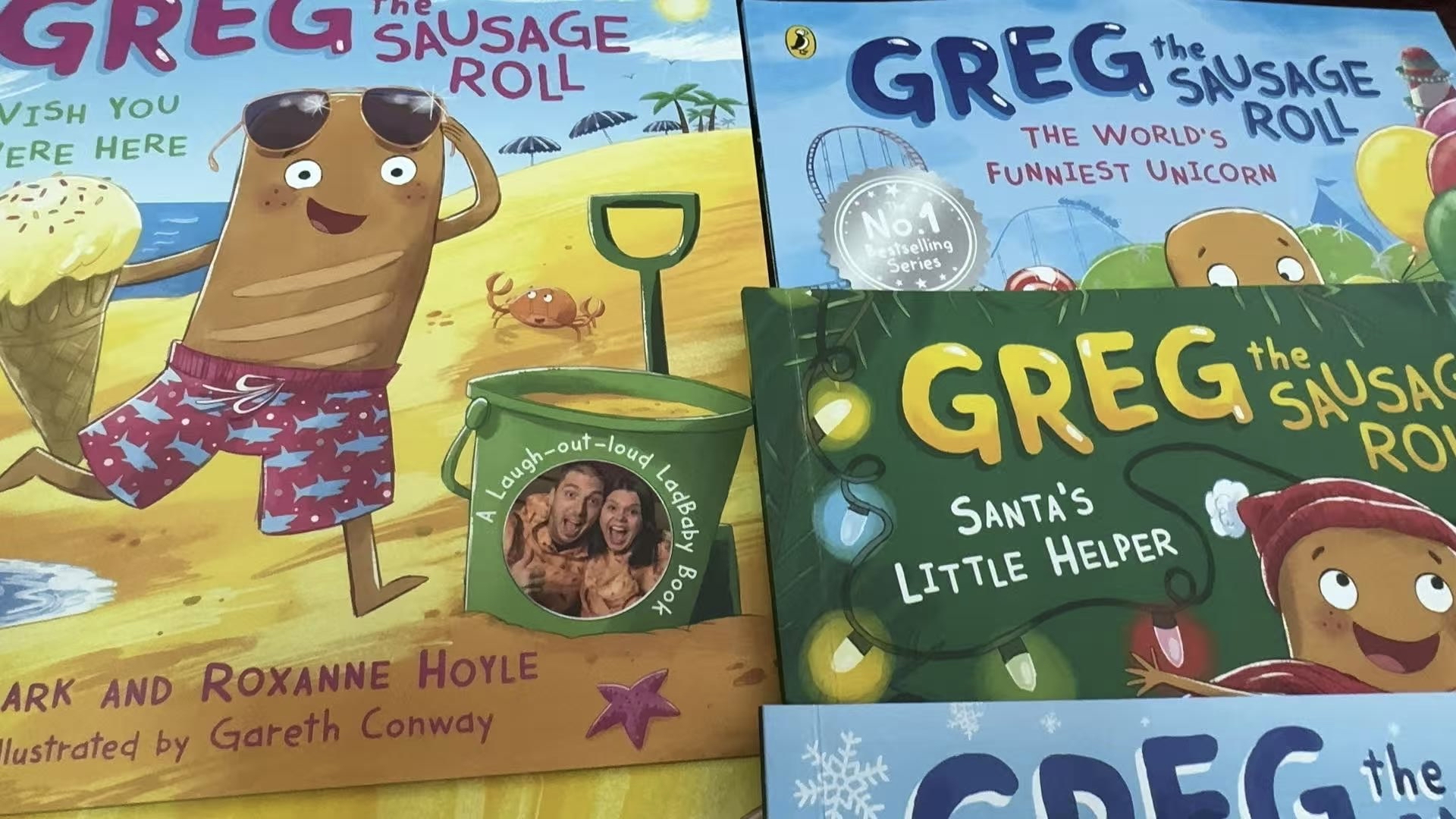 Greg GREG SAUSAGE EGG-CELLENT ROLL EASTER ADVENTURE ou aloud ‹ GREG "AUSAGE ROLL THE PERFECT PRESENT GREG SAUSAGE THE WORLD'S ROLL FUNNIEST UNICORN Noa tselling Series GREG SAUSAGE SANTA'S ROLL LITTLE HELPER h-out-loues GREG SAUSAGE ROLL WISH YOU WERE HERE Thank you Girag and Girial Tanutk maly DOES asle ou true woll Lou fron Easter Burn nap