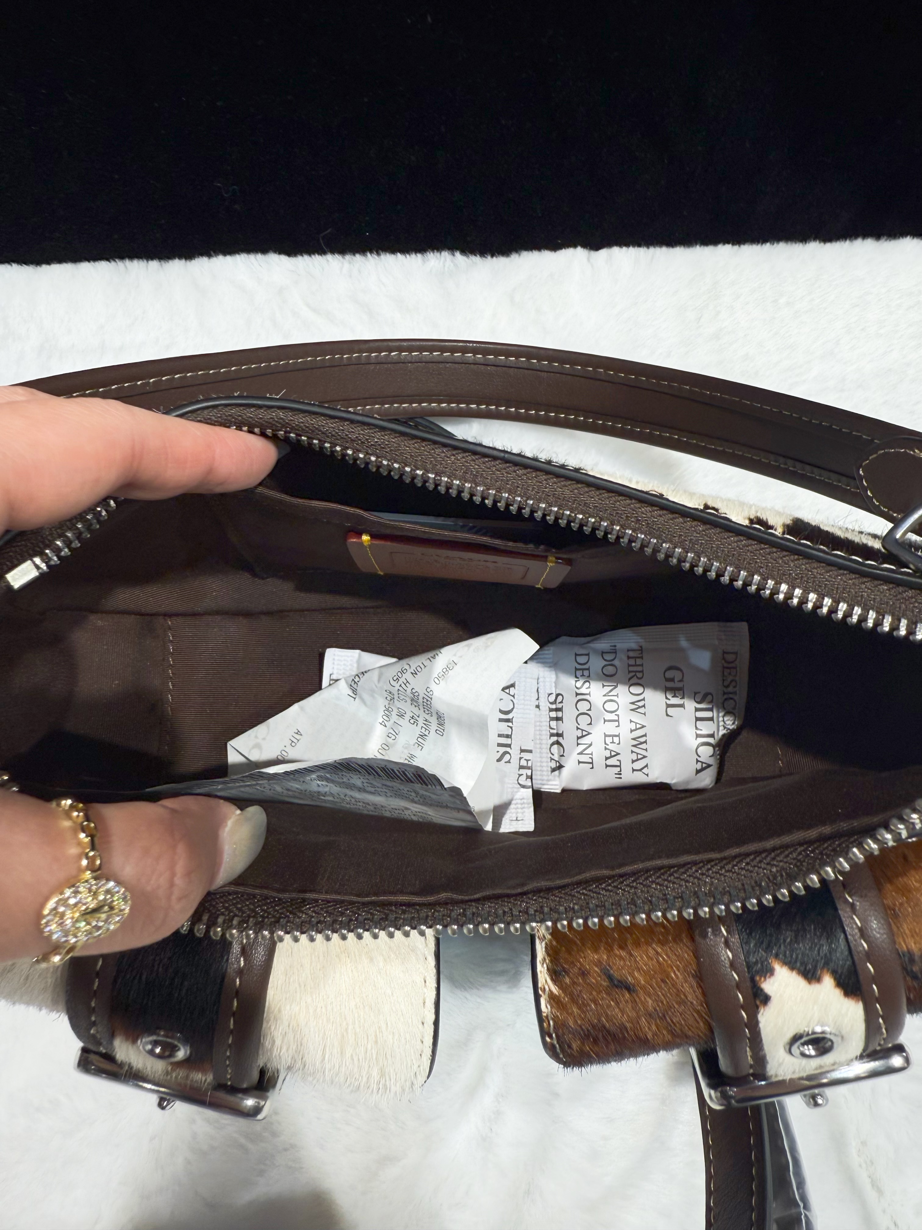 Coach Ashton bag cow print/haircalf