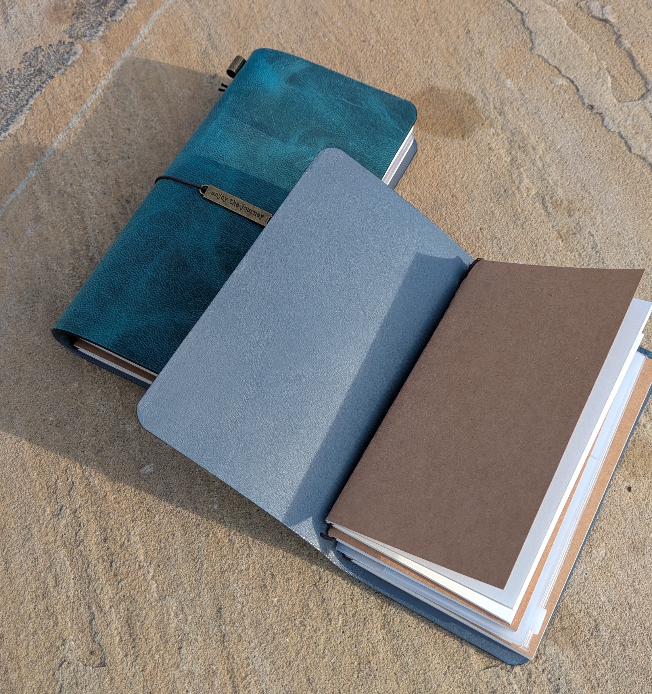 Hand-finished teal crazy horse leather, marked by natural pull-up lightening and organic marbling |