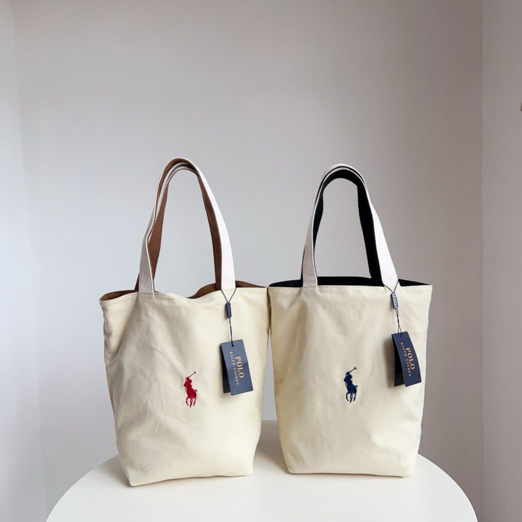 $115隻。2隻起$105隻。RL Polo雙面帆布托特包