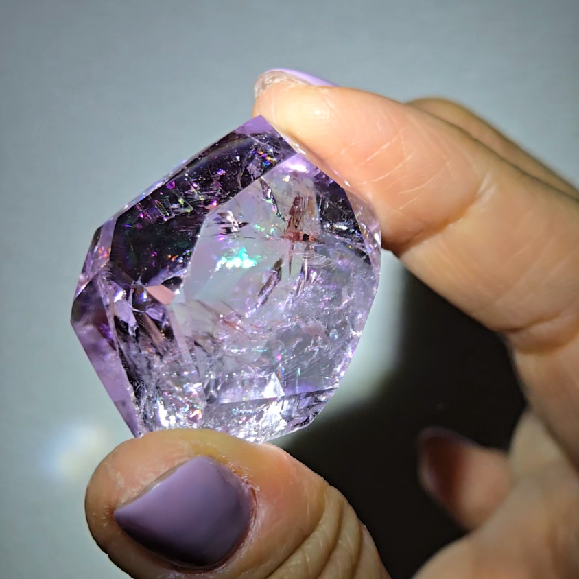 Amethyst pocket stone with rainbows and clarity - AM67