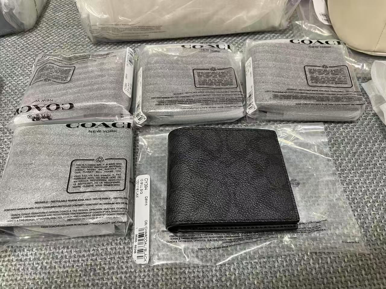 COACH經典老花銀包