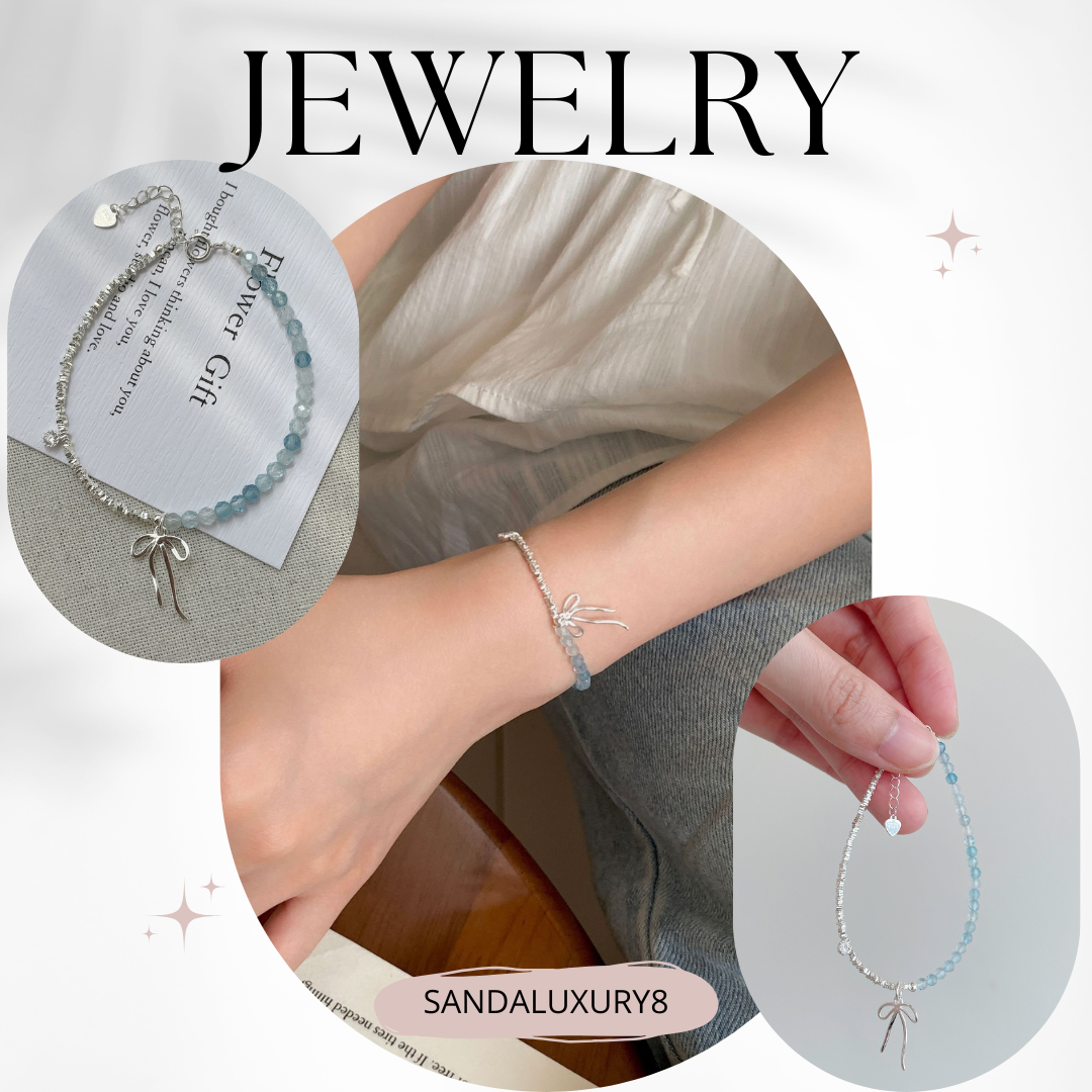 Silver Bracelet with Blue Beads and Bow Charm