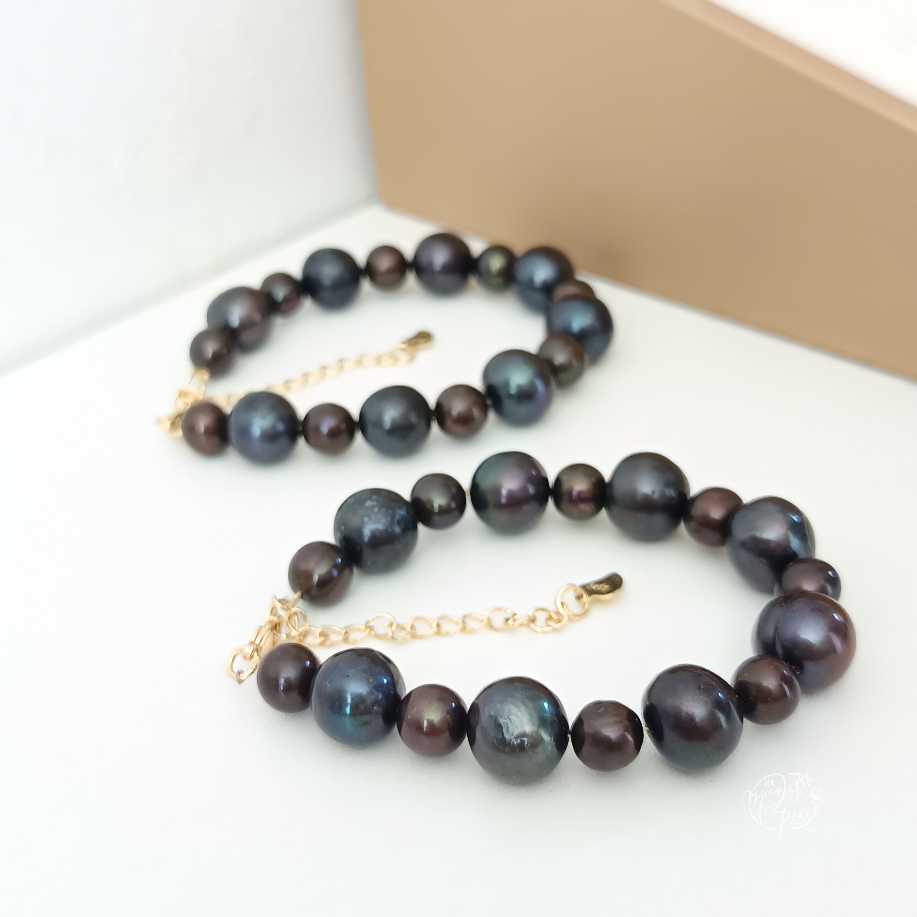 特價品‼️近正圓強光淡水優化黑+啡色珍珠注金尾鍊扣手鍊