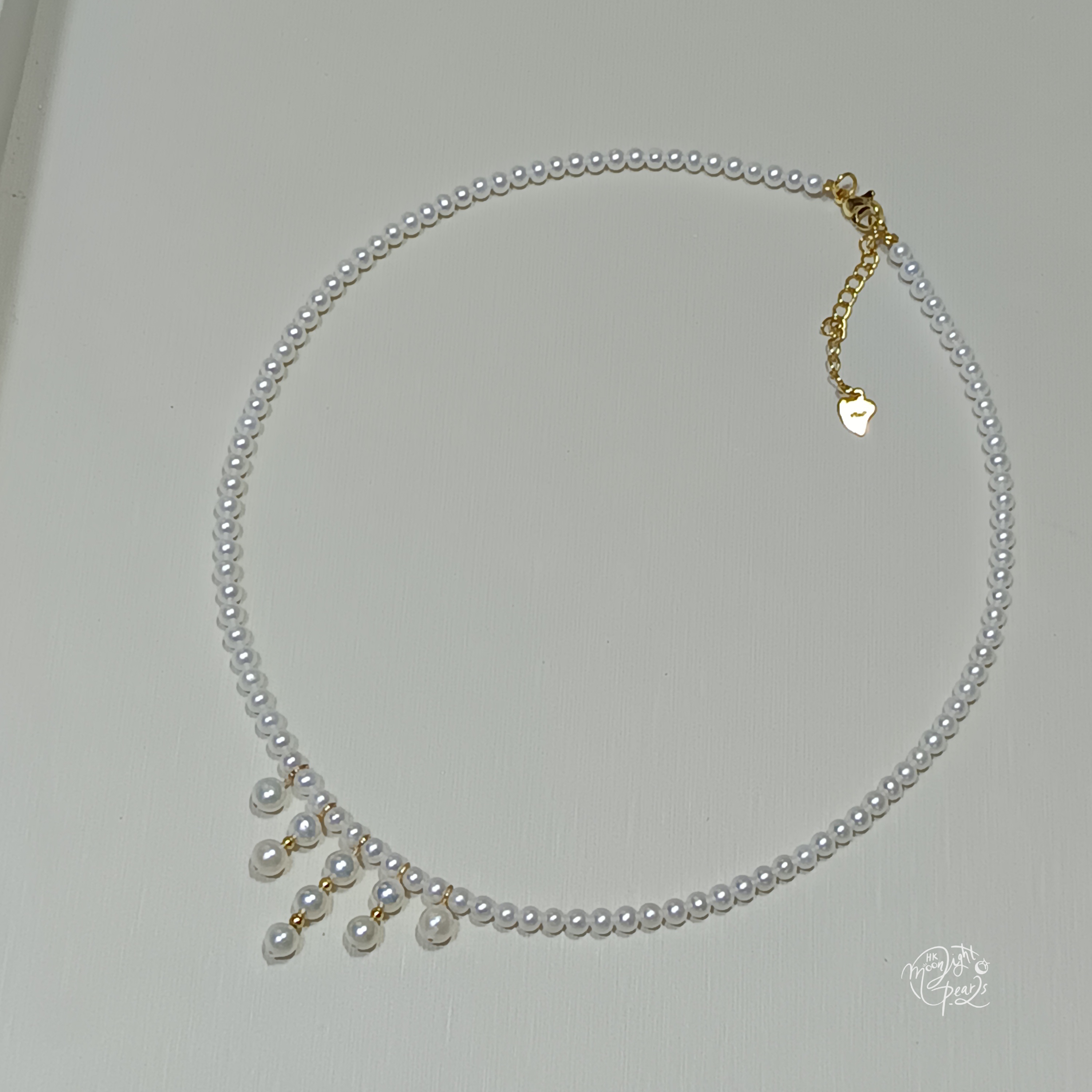 近正圓極強光淡水ak白細胞珍珠注金愛心尾鍊扣時尚流蘇項鍊