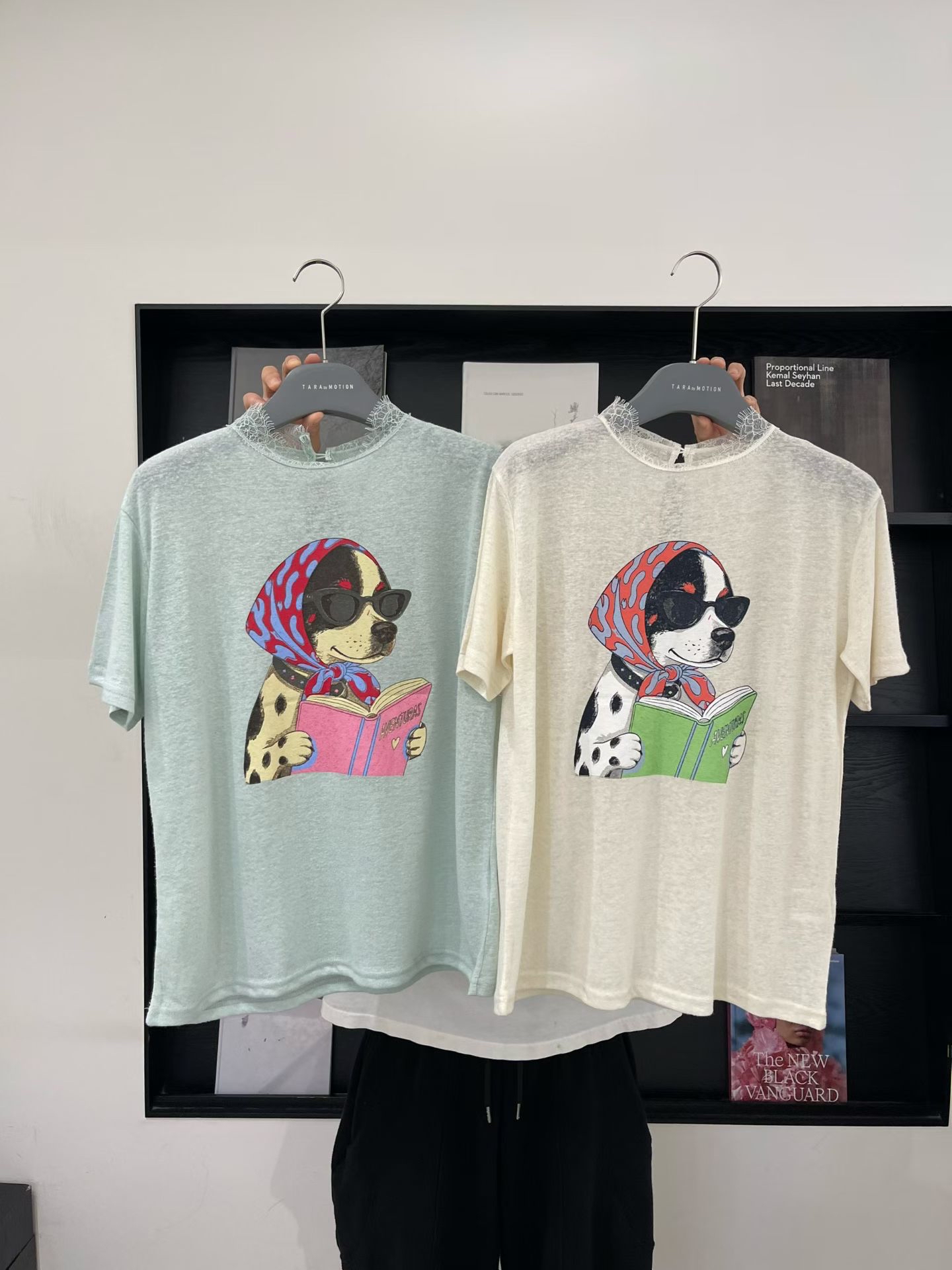 A dog reading book printed tee