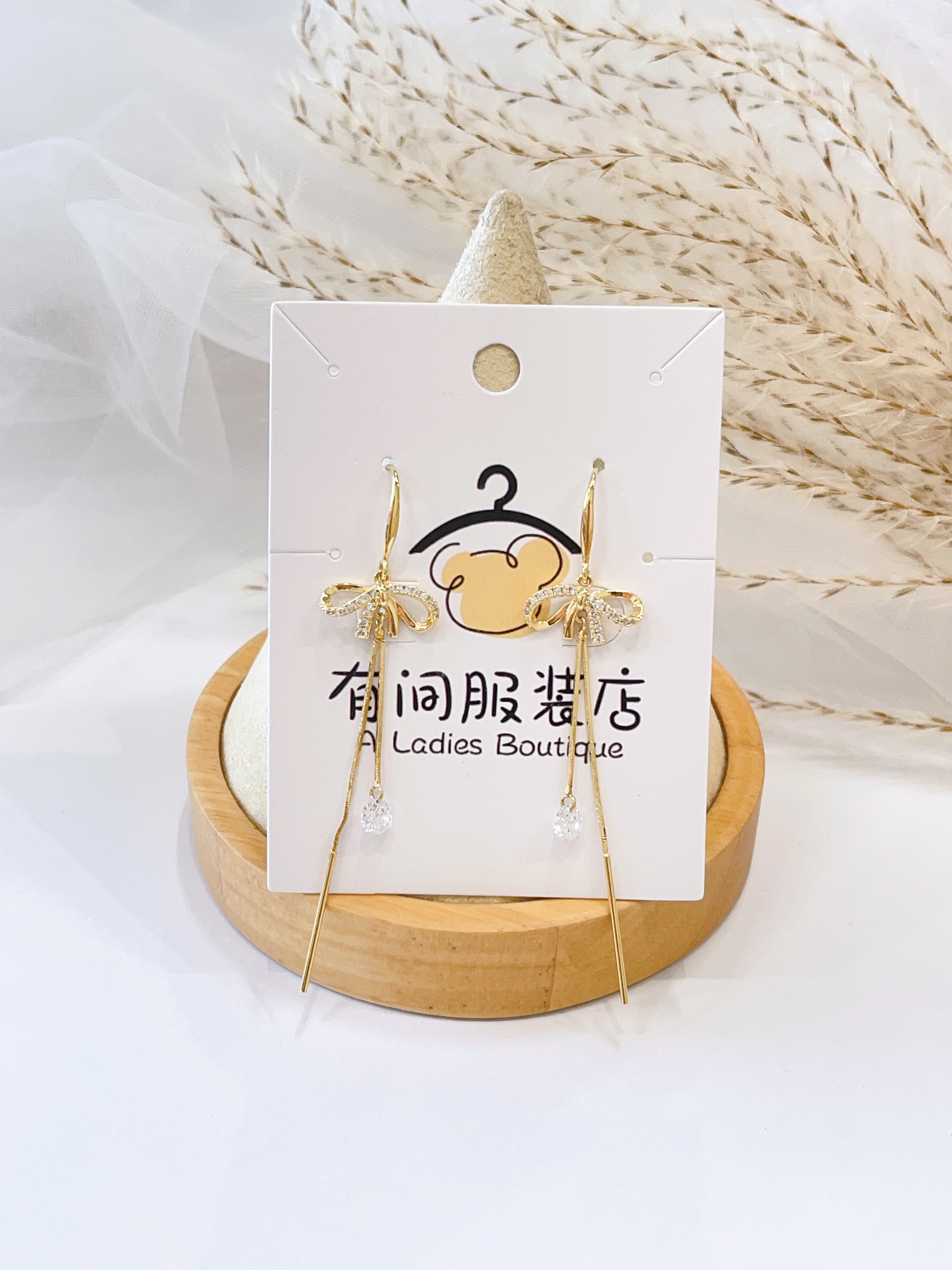 温柔蝴蝶结钻石流苏耳环