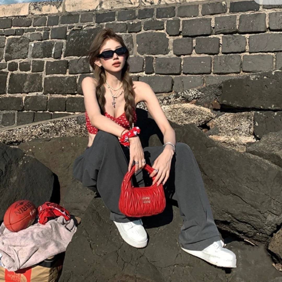 Miu Miu Quilted Leather Handbag: Chic and Versatile Designer Bag