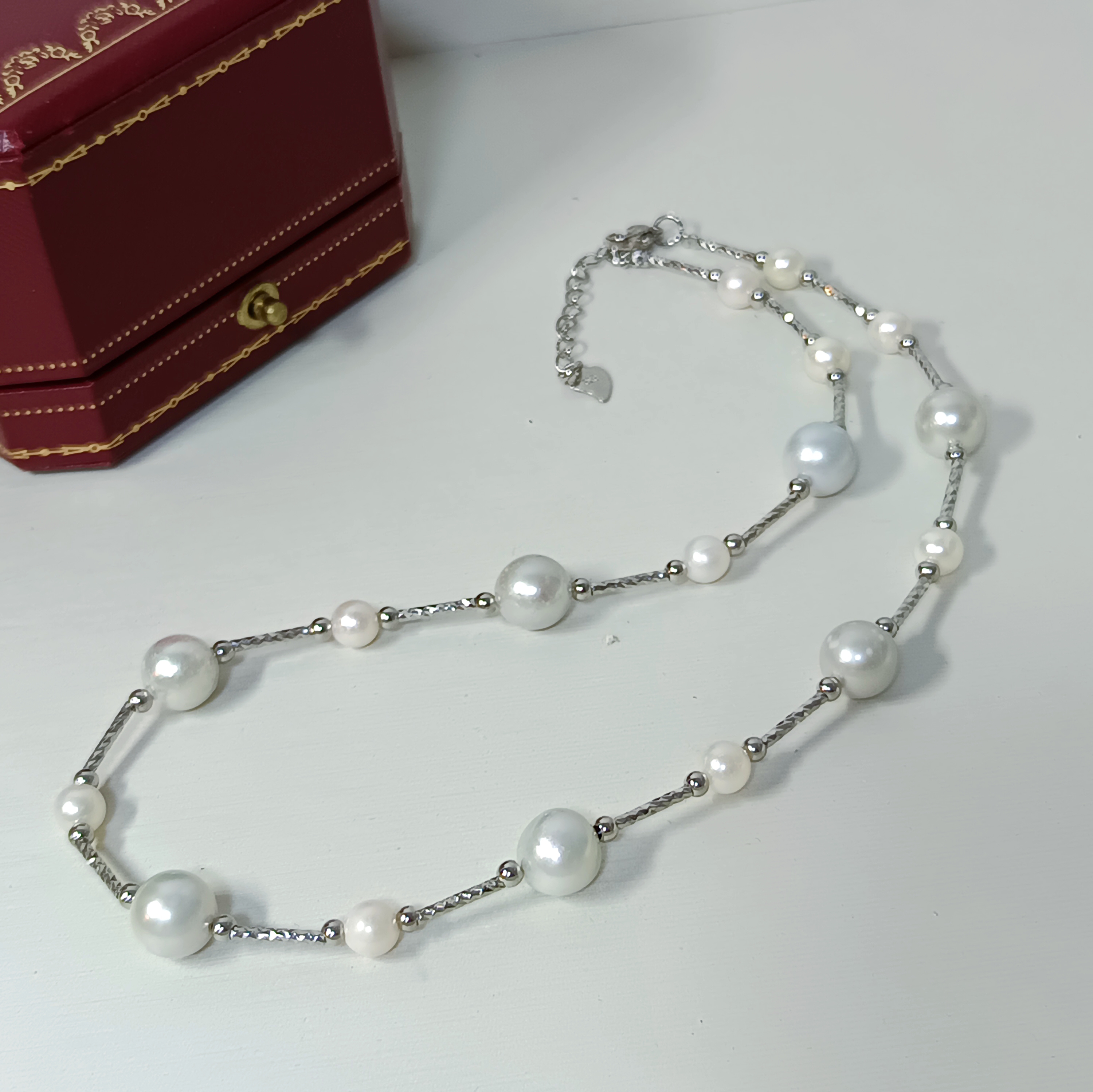 正圓強光日本akoya 海水珍珠+銀灰色真多麻海水珍珠滿天星款注白金鎖骨鍊