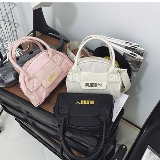 $75隻。2隻起$ 65隻。4色選擇Puma 隨行小包包