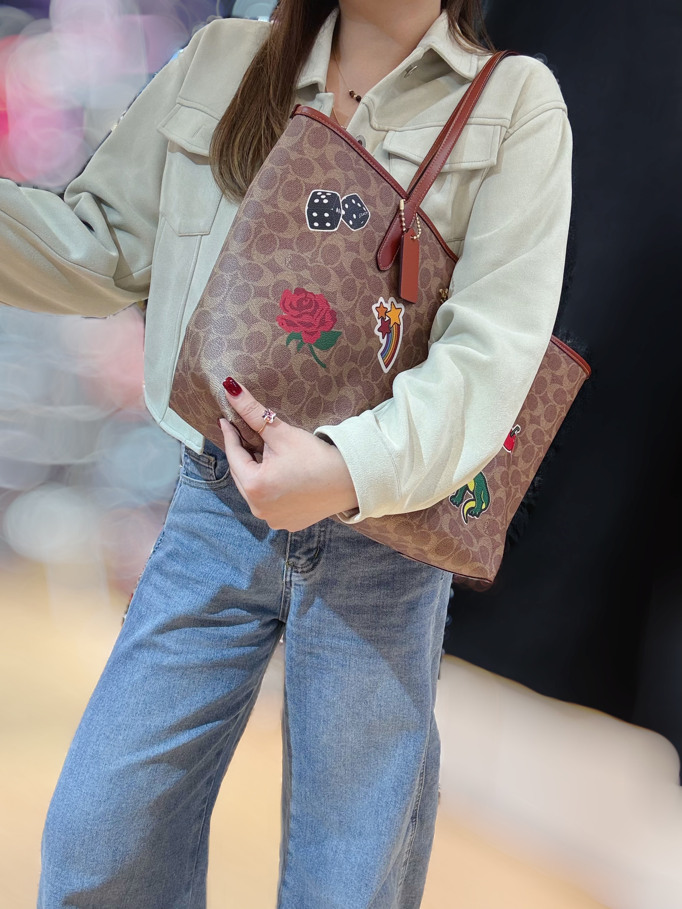 Coach City tote dinosaur