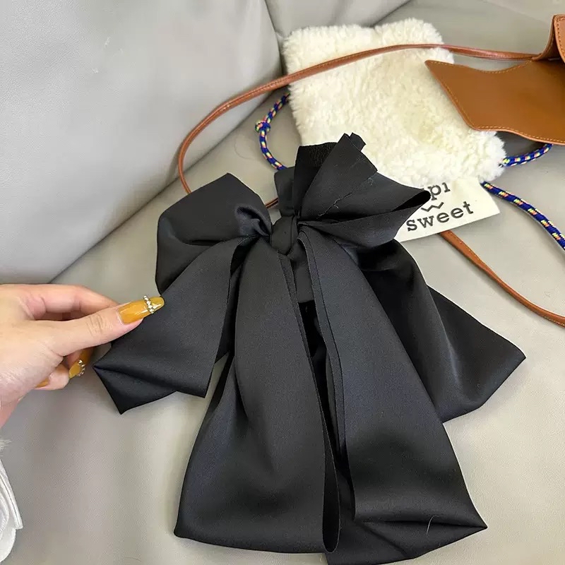 黑色缎面蝴蝶结抓夹