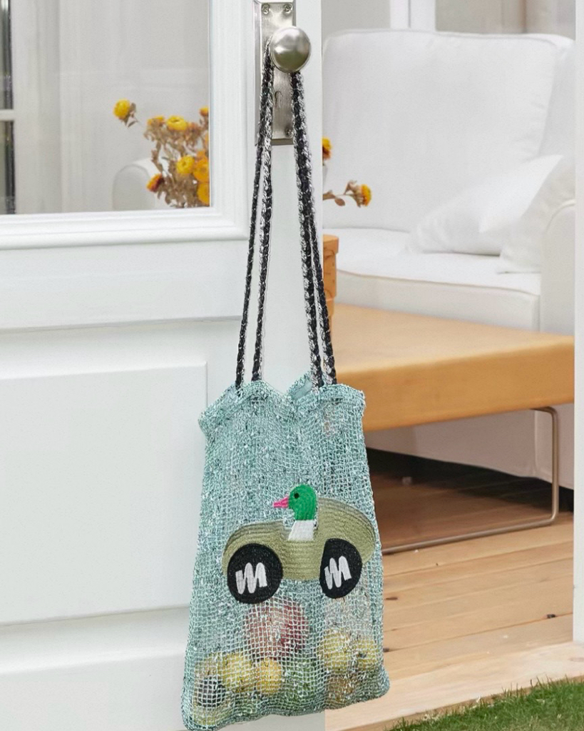 慵懶渡假風網眼托特包