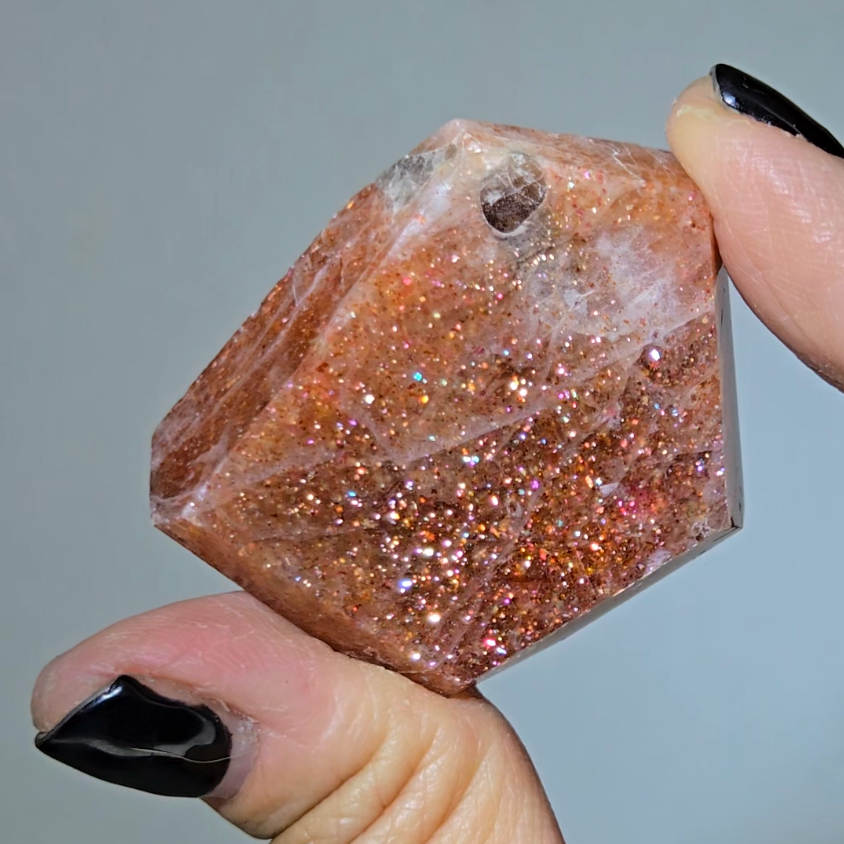 Arusha sunstone with rainbow glitter, smoky quartz inclusions - SM61