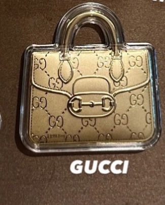 999足金大牌包包0.02g