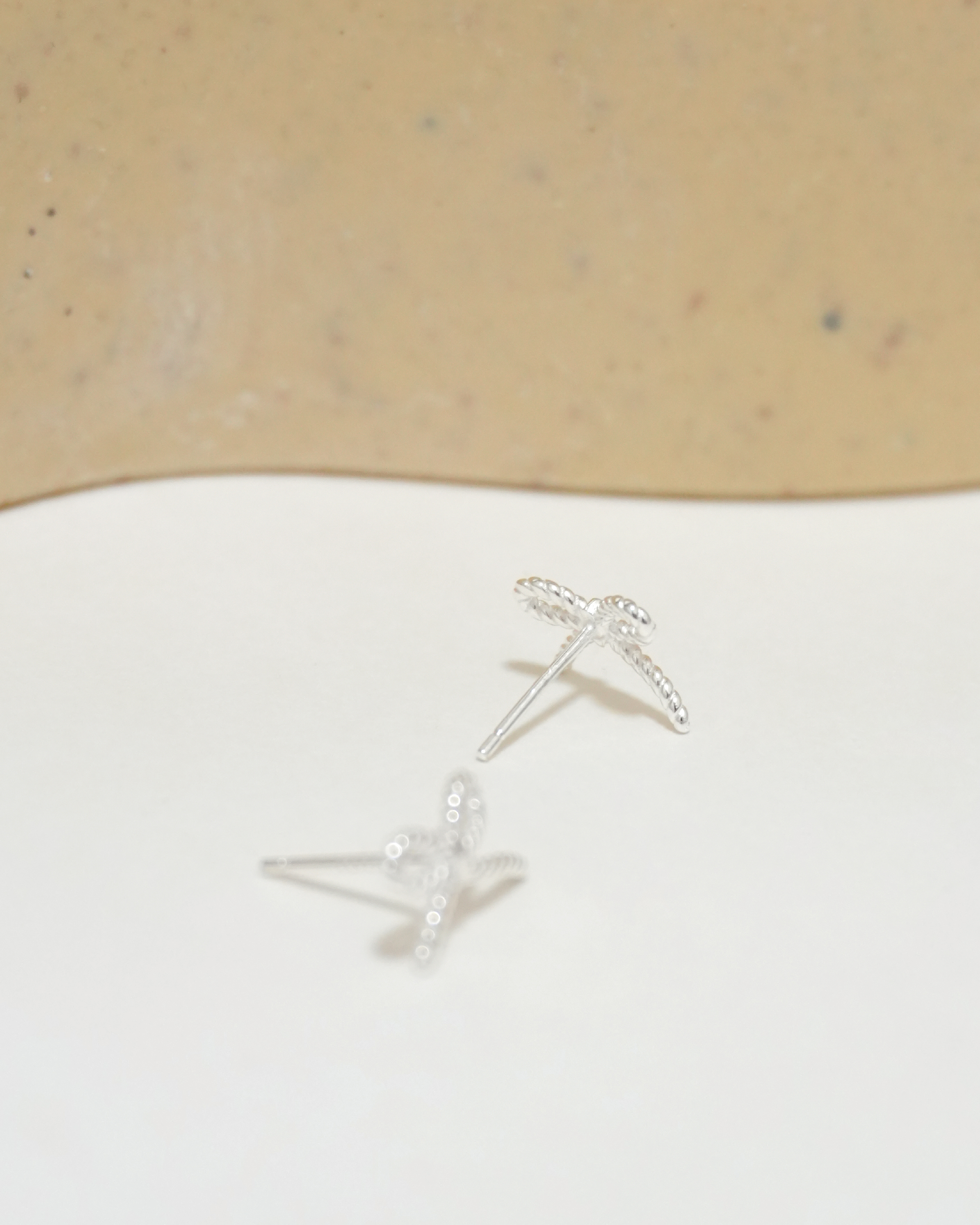 Woven Sleek Bow Earrings 