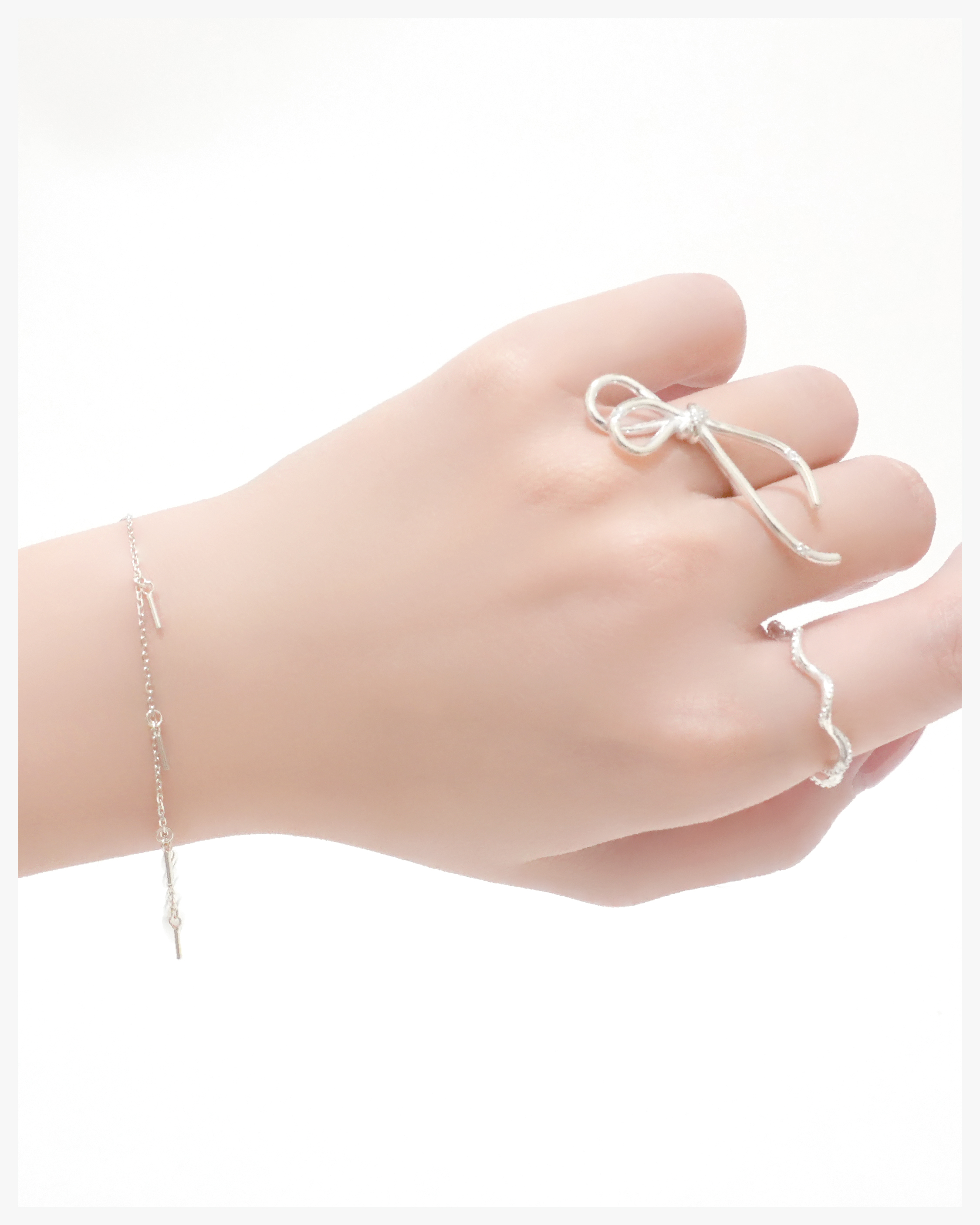 Sleek Silver Tassel Bracelet