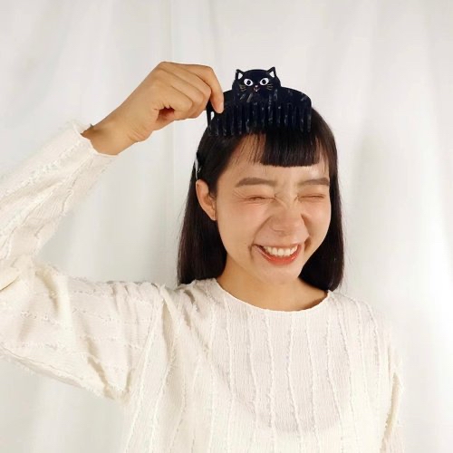 黑貓 梳子