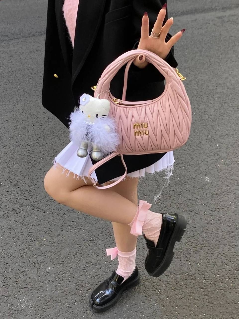 Miu Miu Quilted Leather Handbag: Chic and Versatile Designer Bag