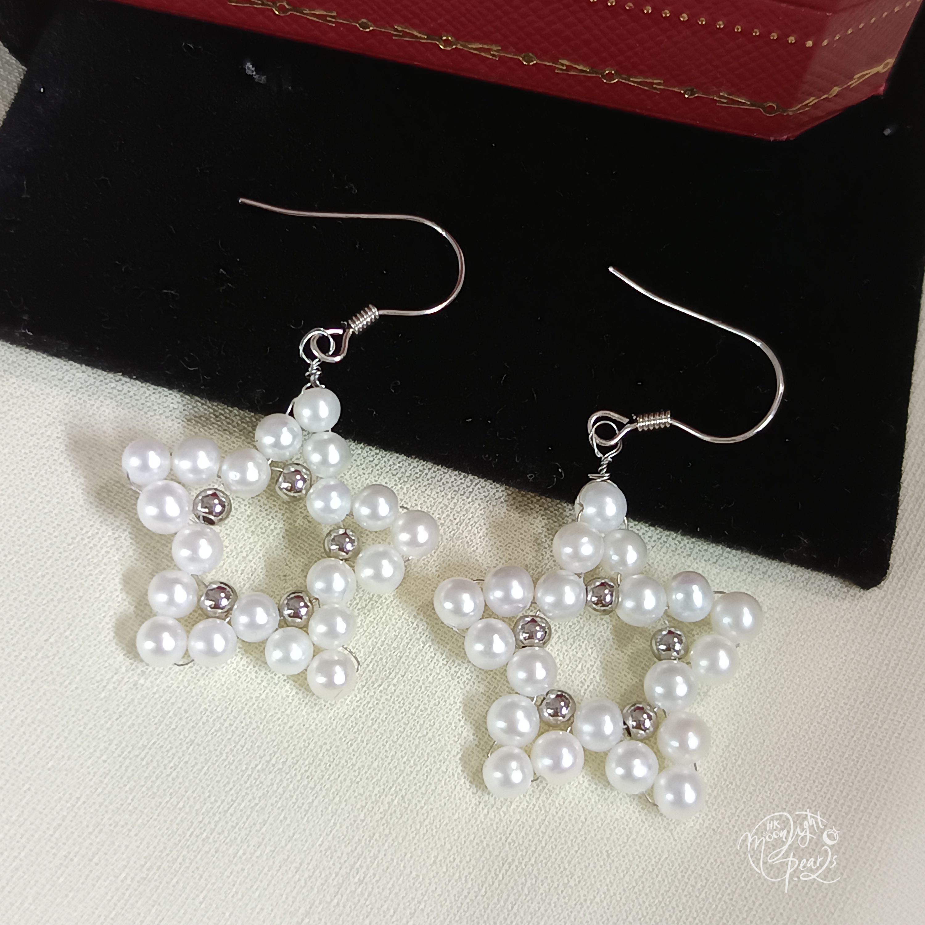 近正圓強光淡水AK白細胞珍珠編織五角星s925銀耳勾