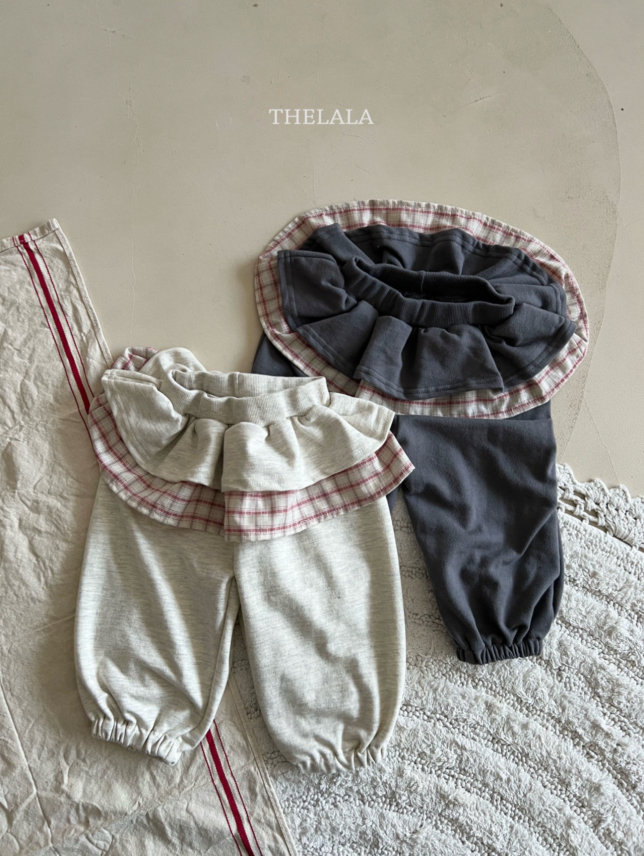 🌸預訂 韓國直送🌸🇰🇷THELALA兩色格紋疊層荷葉邊束腳褲