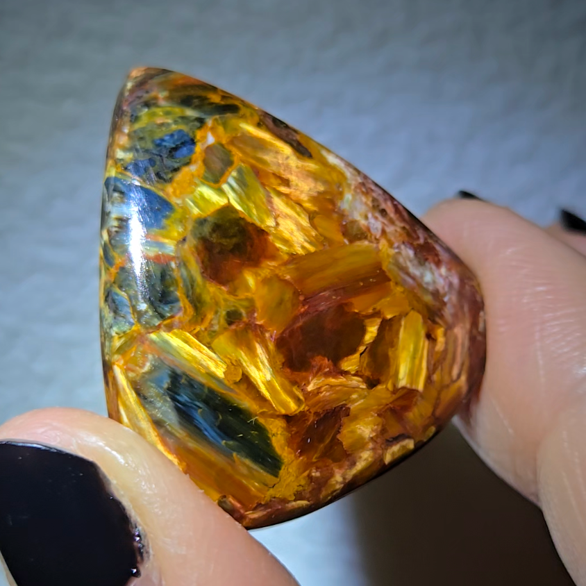 Red, gold, and blue pietersite cabochon - PT10