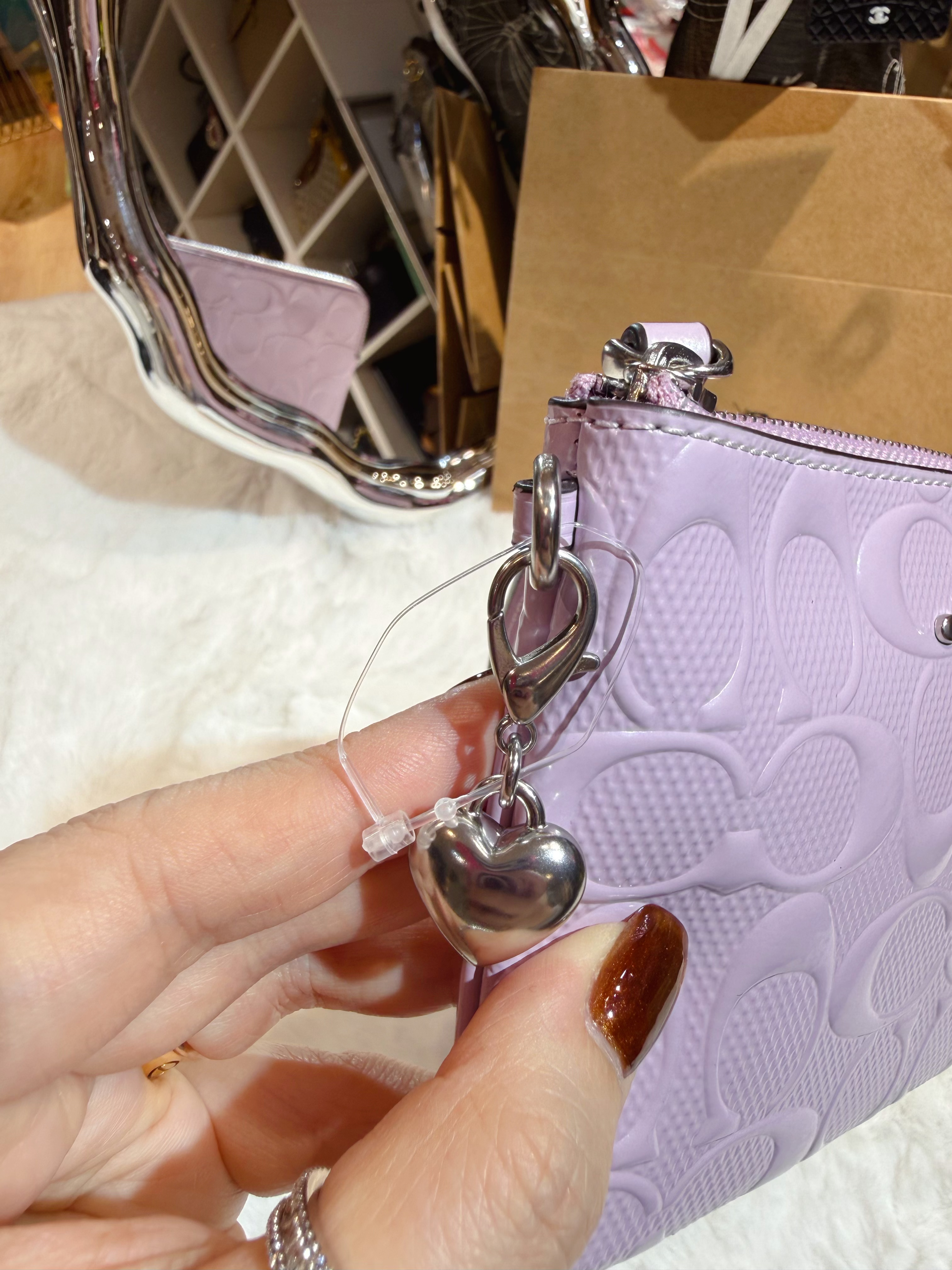 Coach wristlet pat/purple/m