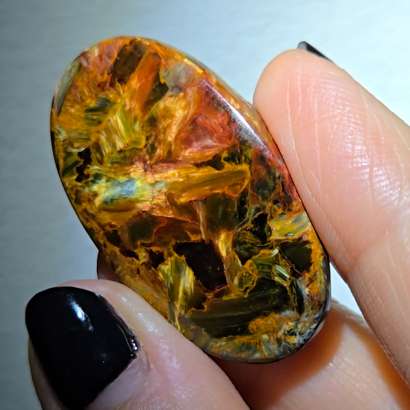 Red, blue and gold pietersite cabochon from Namibia - PT8
