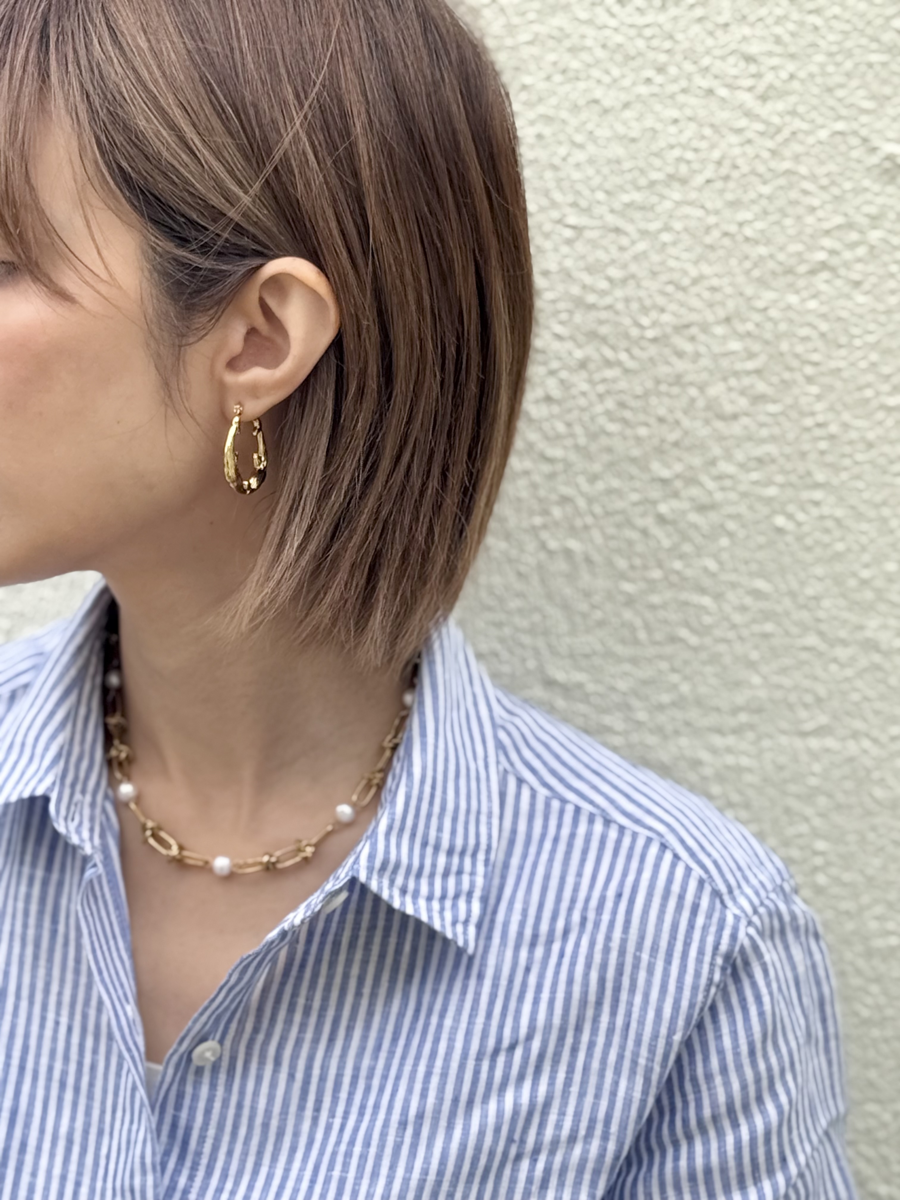 Gold dolphins stainless earring