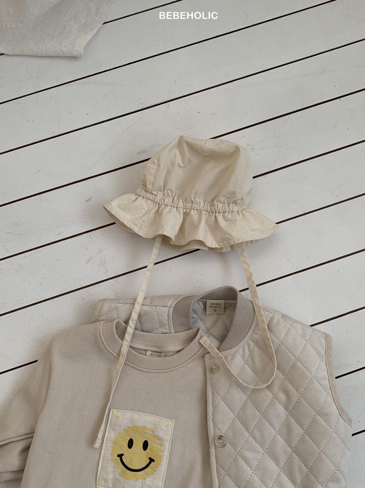 🌸預訂 韓國直送🌸🇰🇷BEBEHOLIC兩色笑哈哈圖案長袖包屁衣