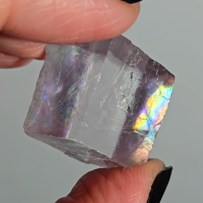 Purple calcite cube with rainbows - PC8