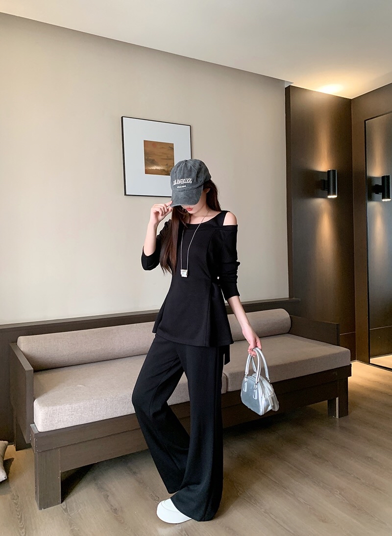 B297(23604) 韩版气质休闲一字露肩显瘦长版上衣与微喇长裤黑套装 
