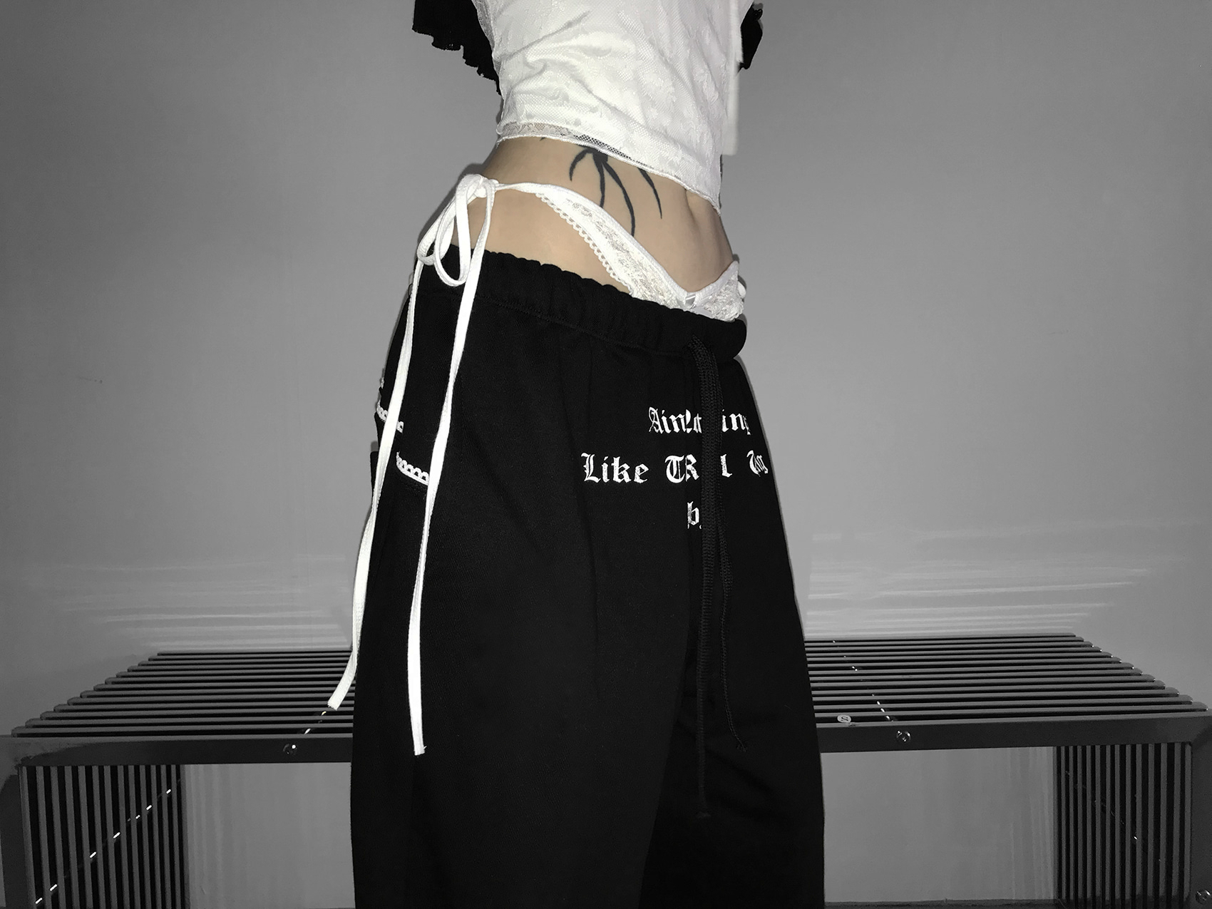 Layered Lace Waist Graphic Wide Leg Pants