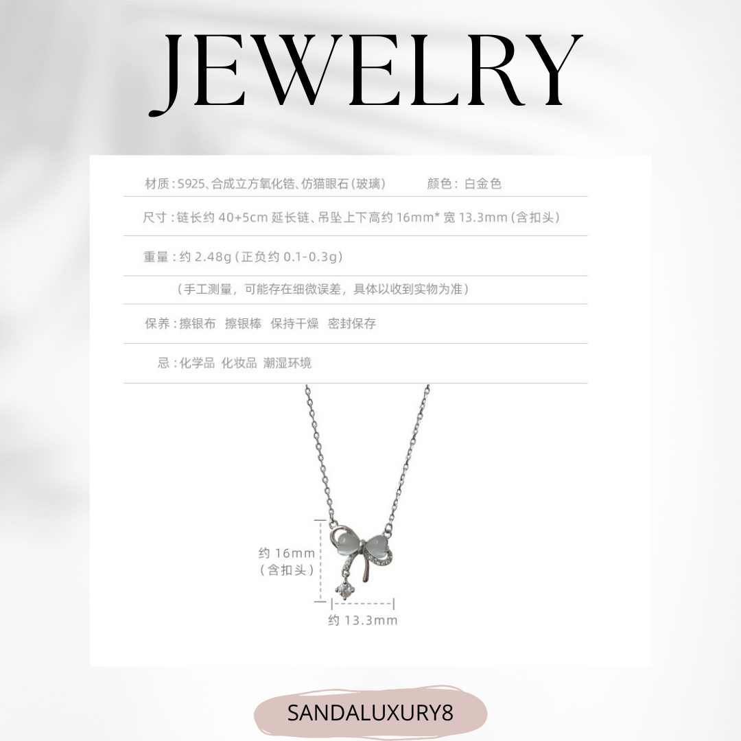 Silver Bow Pendant Necklace with Zirconia Stone Accent