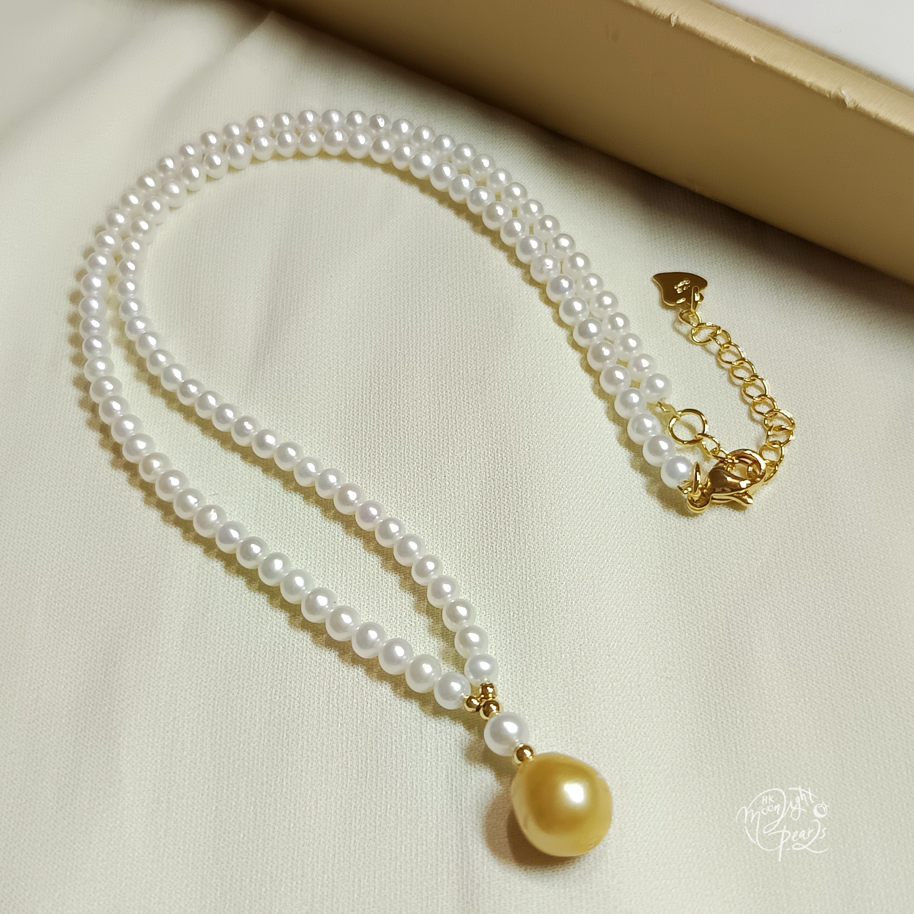 近正圓強光淡水AK白細胞珍珠+水滴南洋濃金海水珍珠注金尾鍊扣項鍊