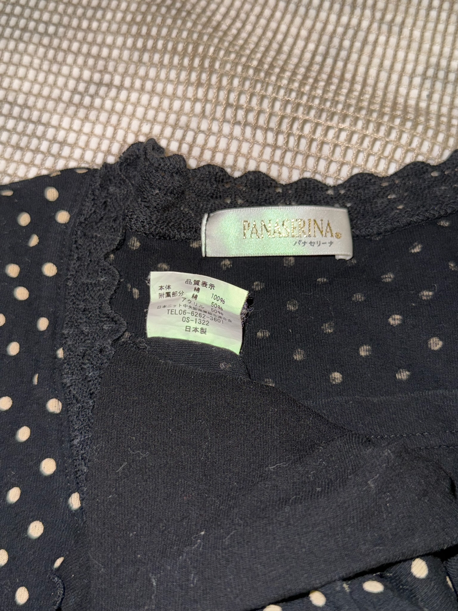 Polka Dot Peplum Top with Lace Trim