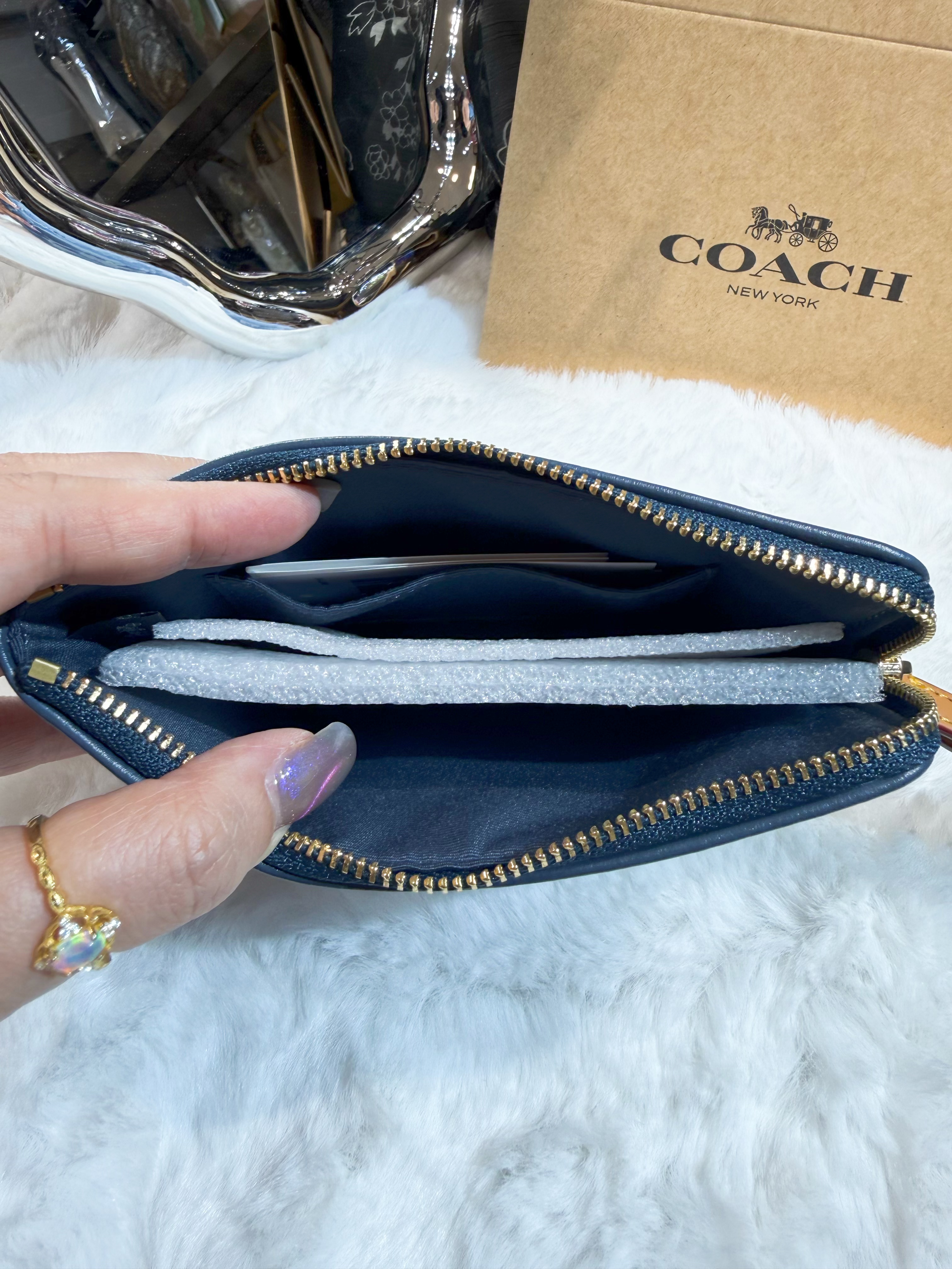 Coach wristlet light denim
