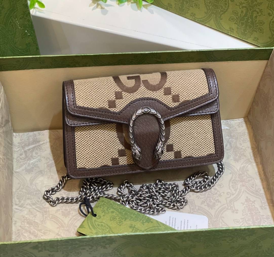 。✈️✈️✈️🔥帆布 Dionysus酒神系列# ▫️型号：476432 ▫️尺寸：16.5*10*4.5cm 𝐷𝑖𝑜𝑛𝑦𝑠𝑢𝑠酒神系列！必入啊‼️ 迷你太可耐了！全新大G帆布与棕色牛皮相撞！醒目双虎头搭扣，今年时尚单品一定少不了的身影、时尚乌木色简直太赞了👍休闲又减龄！