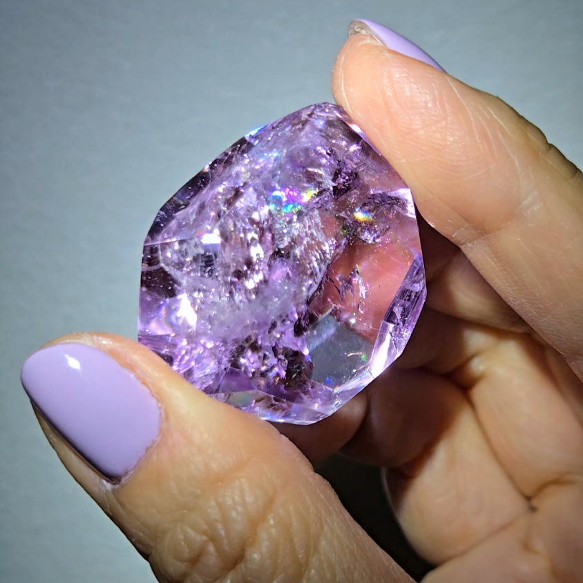 Amethyst pocket stone with rainbows and clarity - AM67