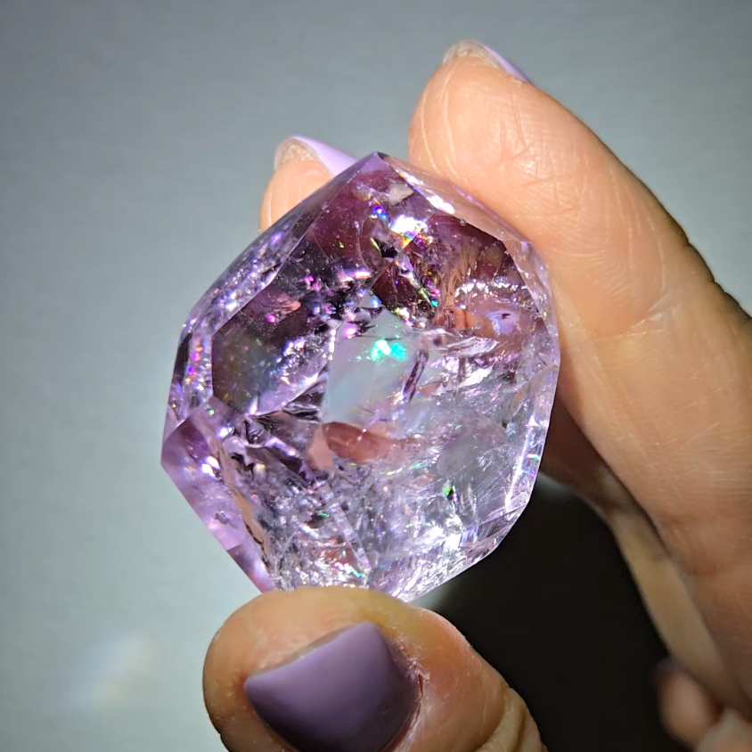 Amethyst pocket stone with rainbows and clarity - AM67