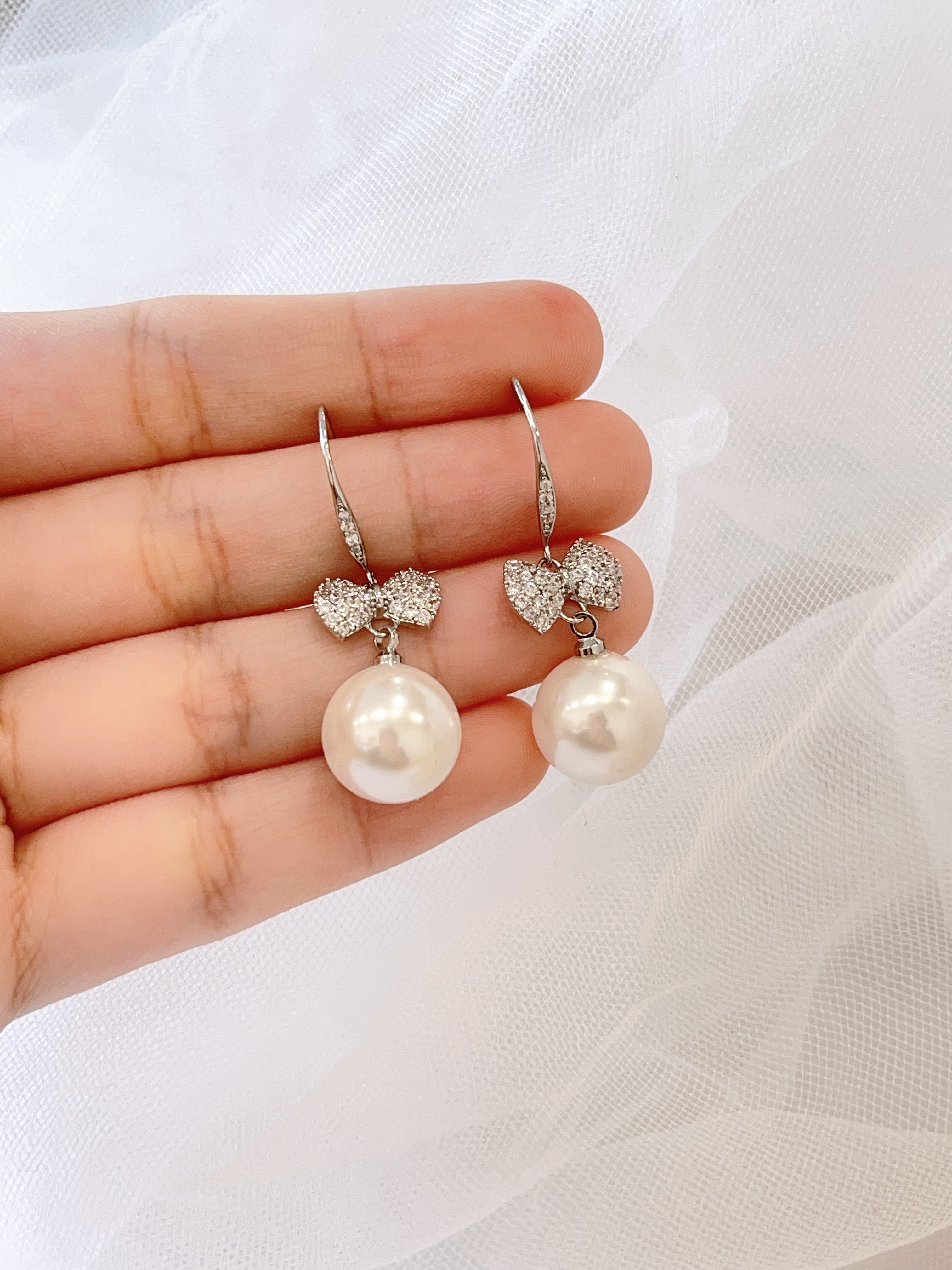 甜美镶钻蝴蝶结珍珠耳环