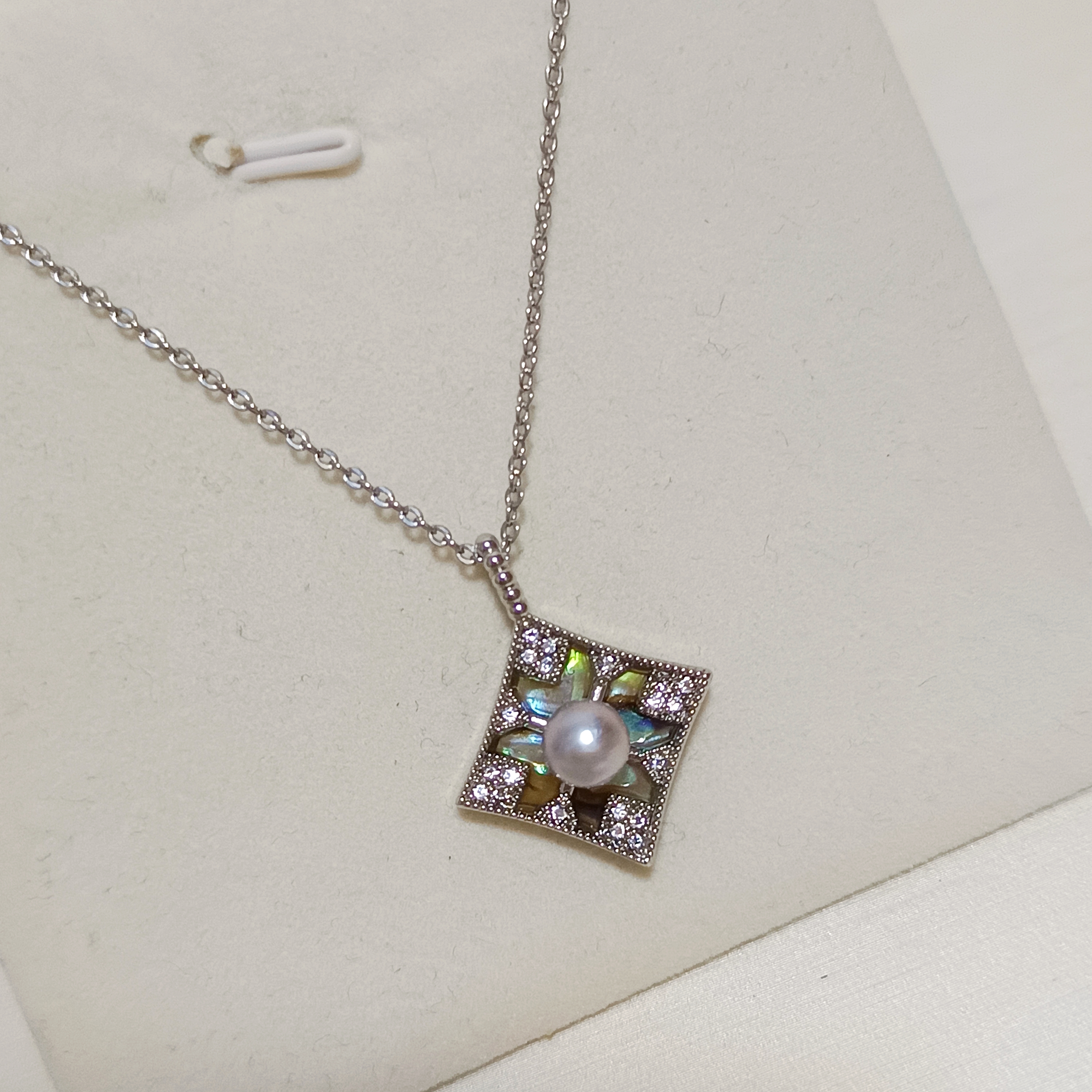 特價品‼️正圓強光日本真多麻海水珍珠注金鮑魚貝可雙面吊墜（送注白金鍊）