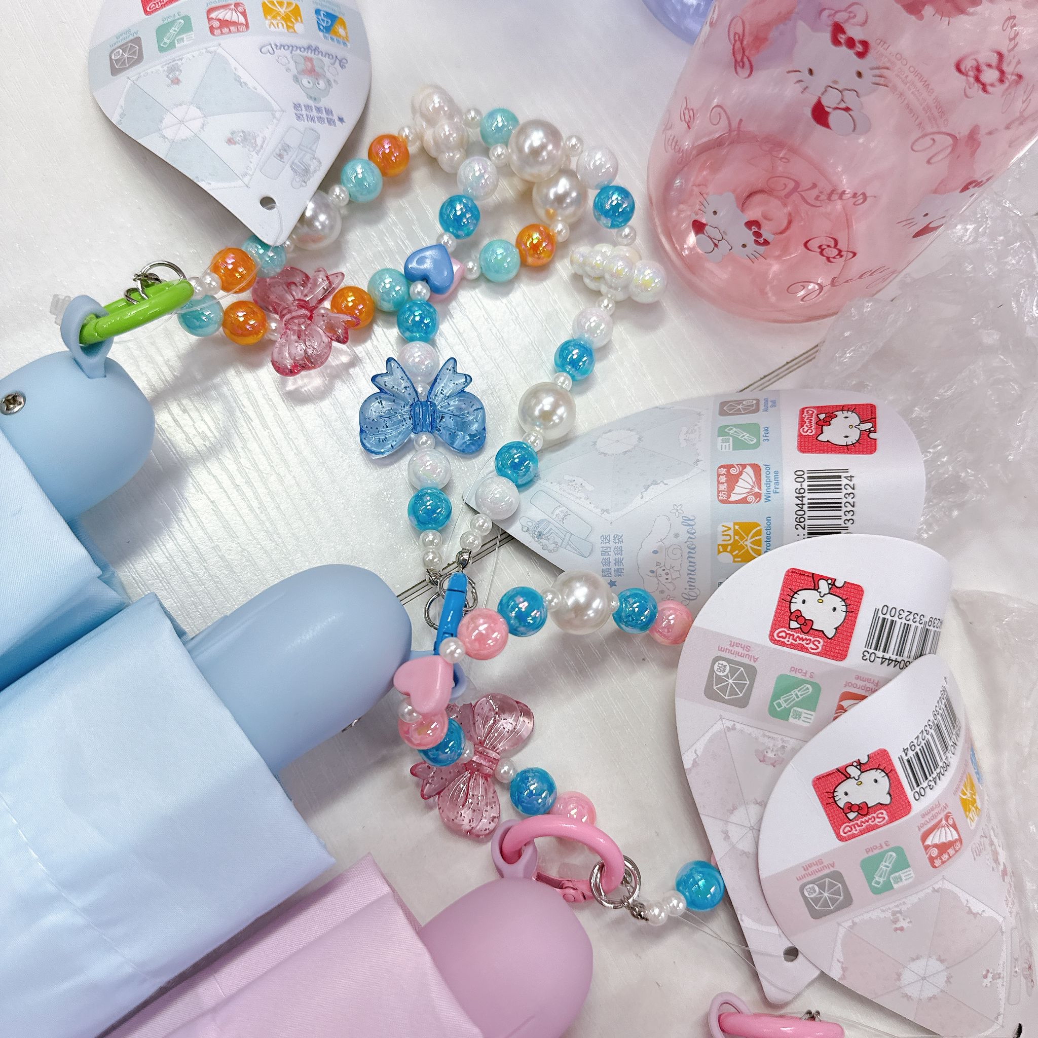 原裝行貨Sanrio 靚靚55cm自動縮骨遮配珠鏈 晴雨兼用 防uv