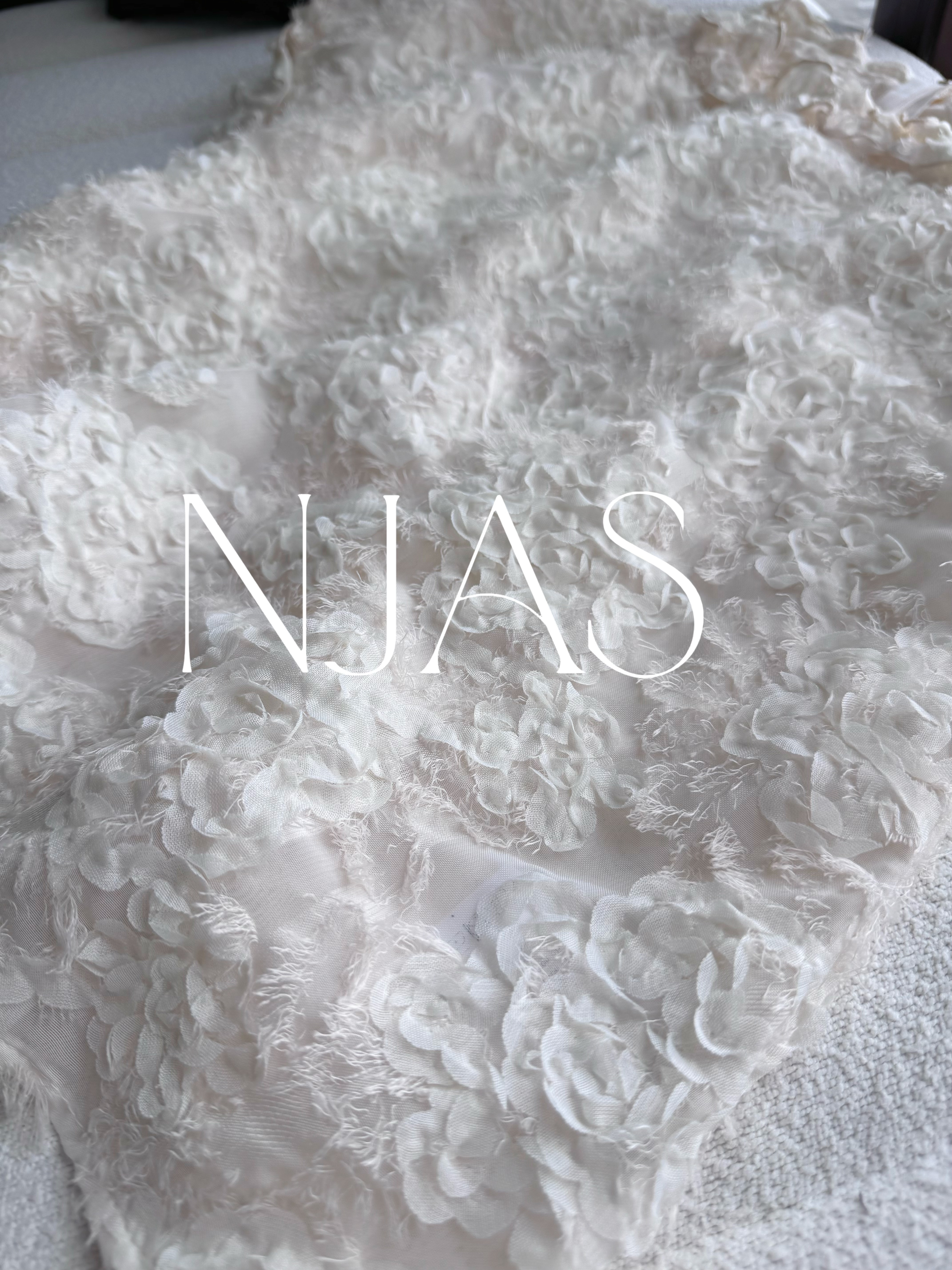 Feminine textured flower blouse