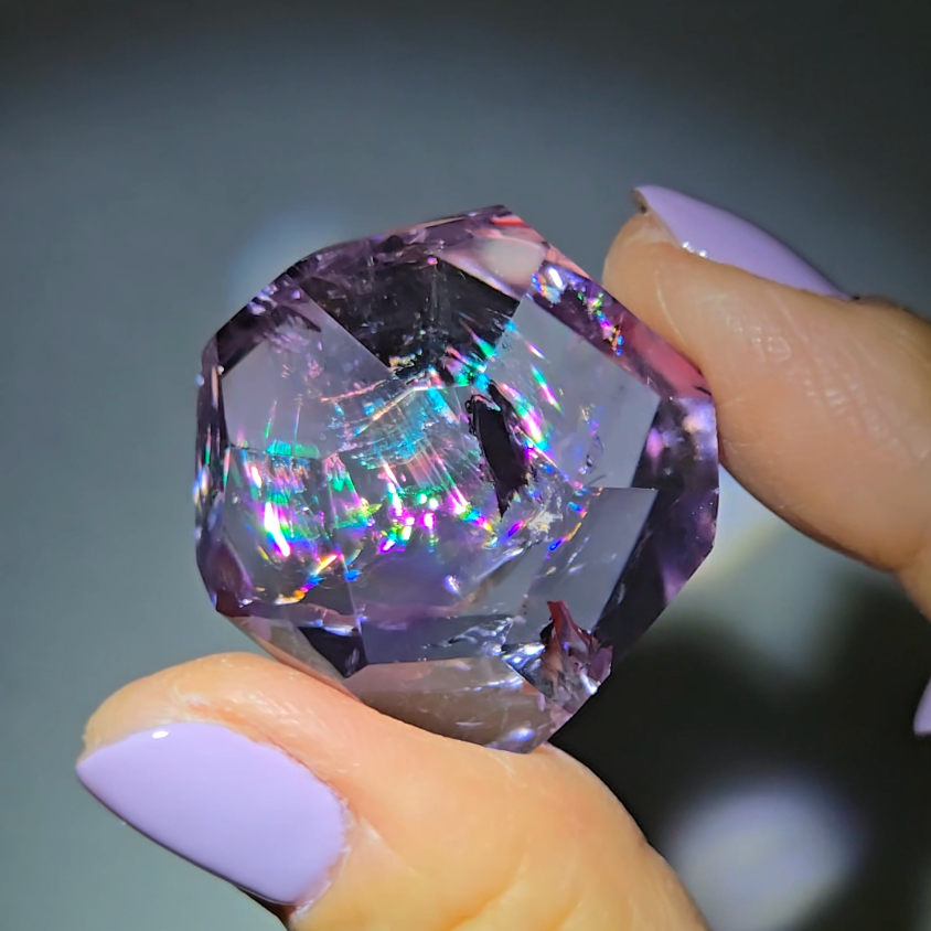 Amethyst pocket stone with stunning rainbows - AME61