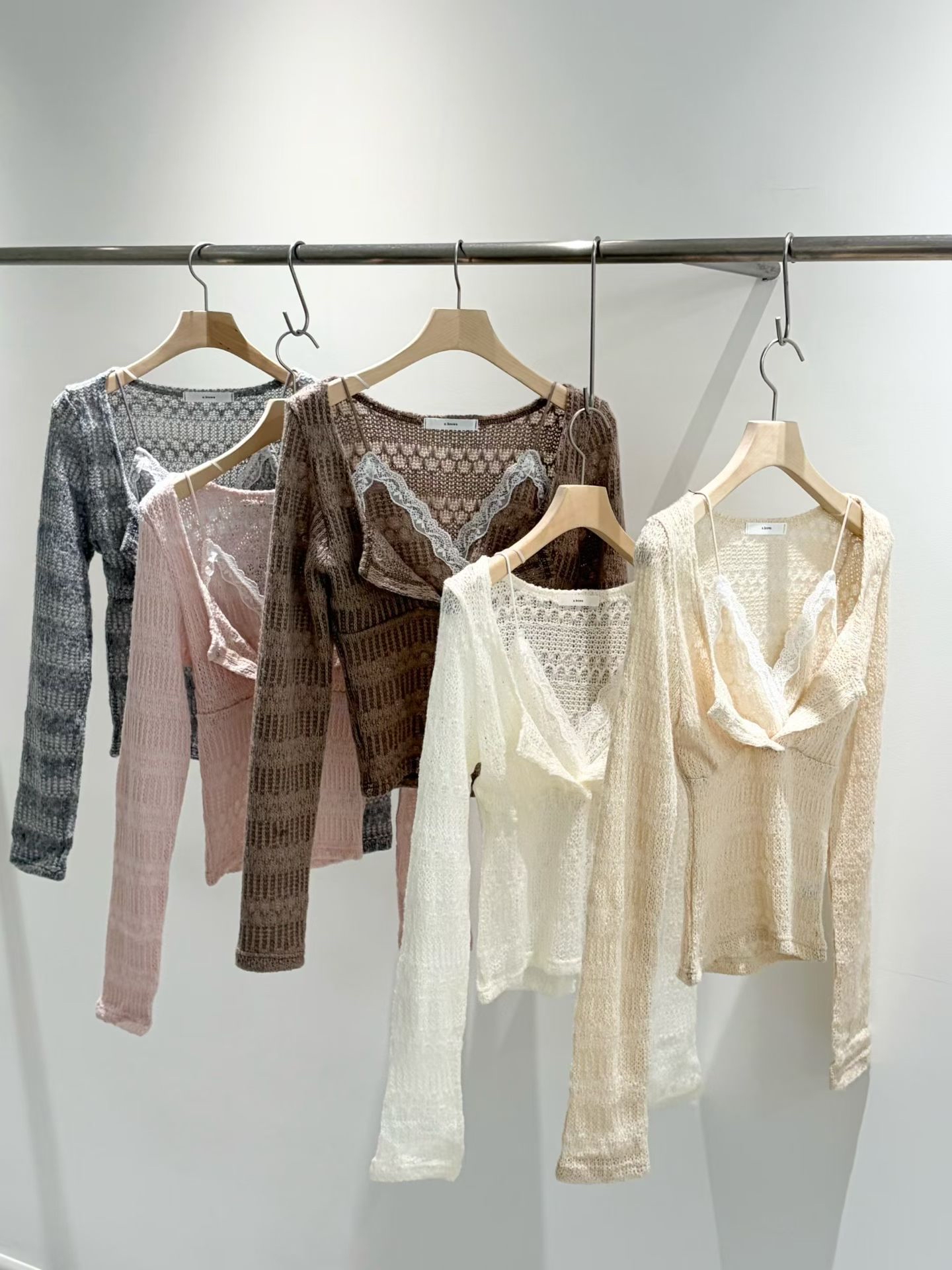 溫柔縷空假2件蕾絲吊帶小毛衣