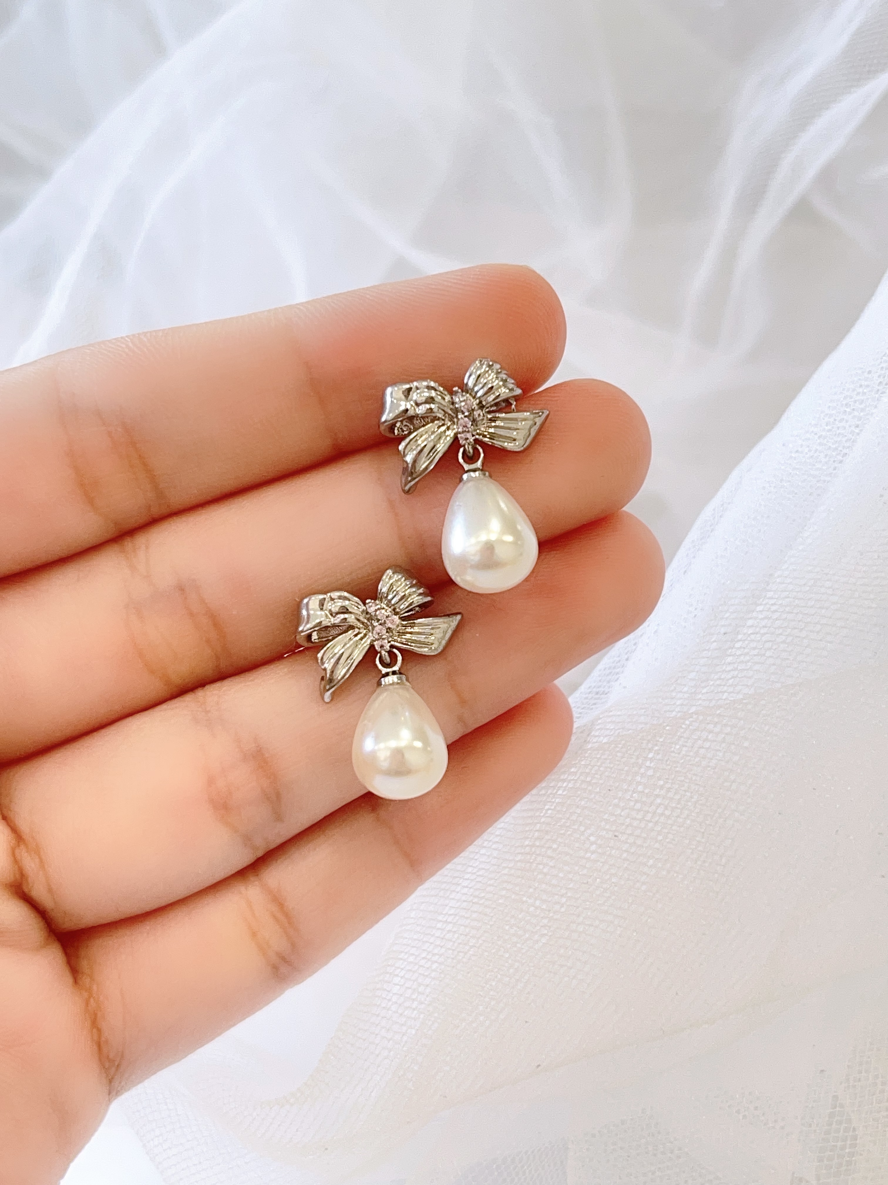 纹路蝴蝶结水滴珍珠耳环