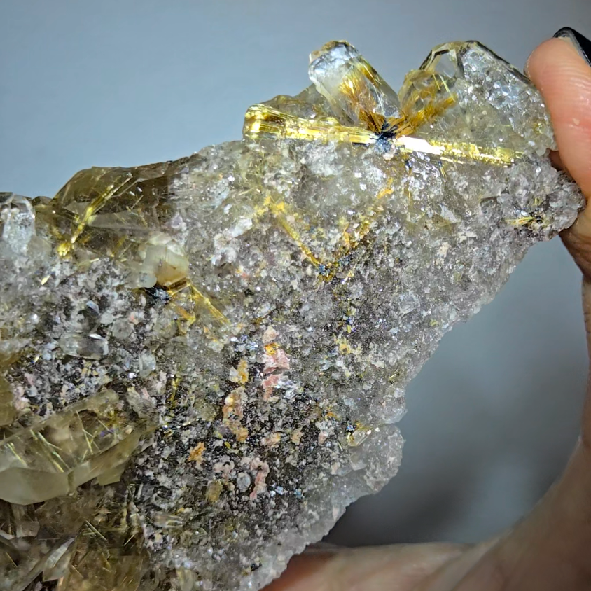 High-grade golden starburst rutiles on black hematite in quartz - RT1434