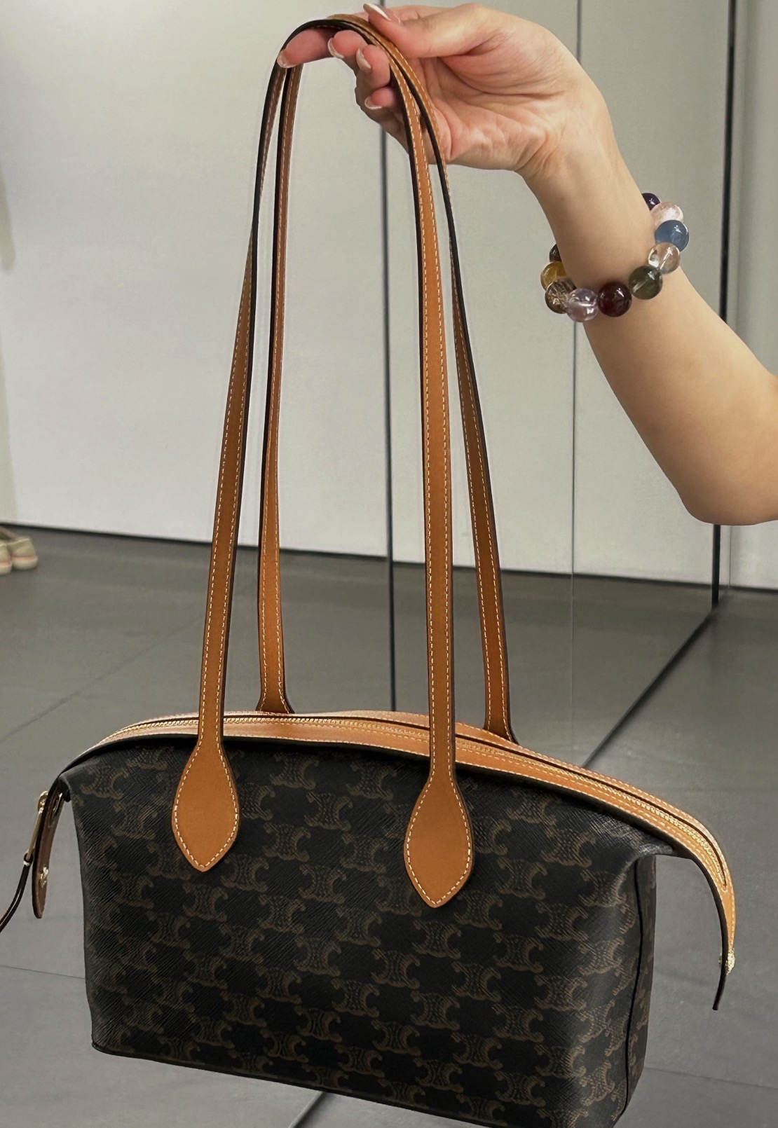 CELINE DUFFLE BAG IN TRIOMPHE CANVAS AND NATURAL CALFSKIN