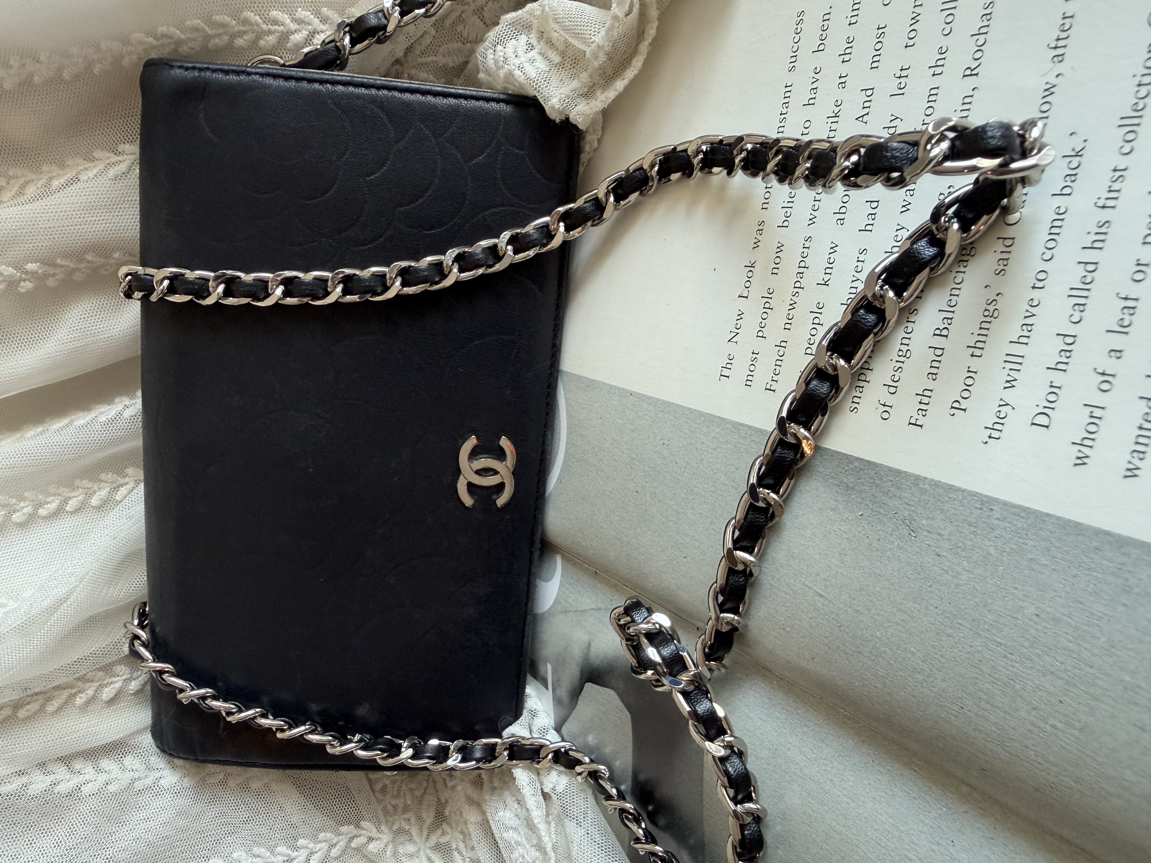 Chanel black leather camellia wallet